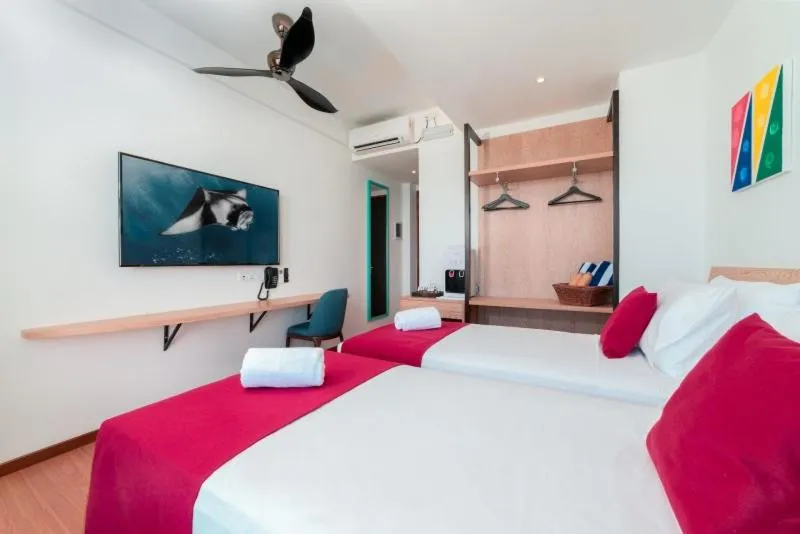 Bed in Ranthari Hotel and Spa Ukulhas Maldives