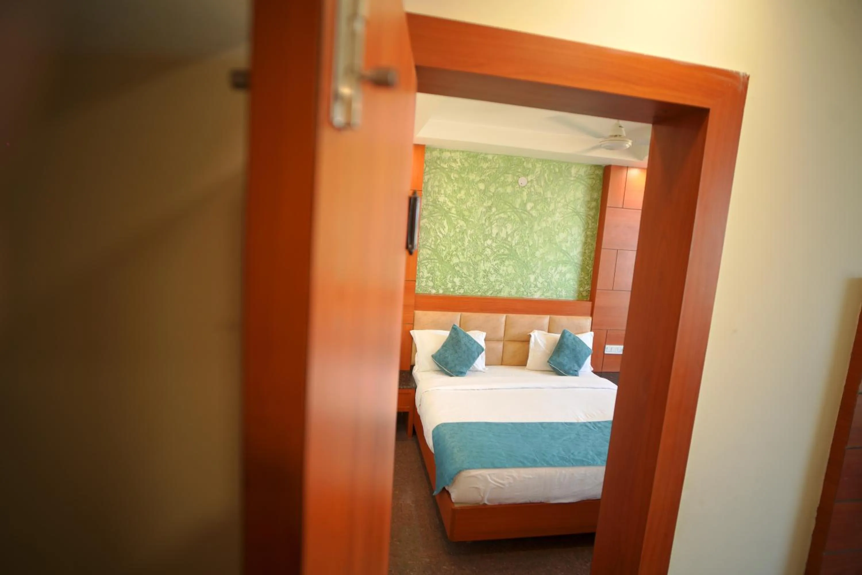 Bed in Hotel Kalka Royal