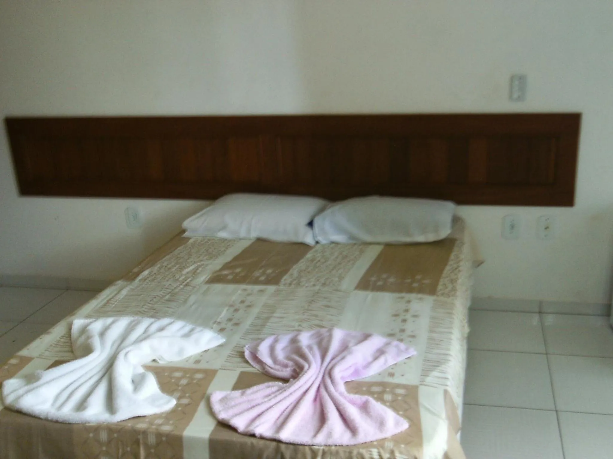 Bed in Pousada Lua de Tomate