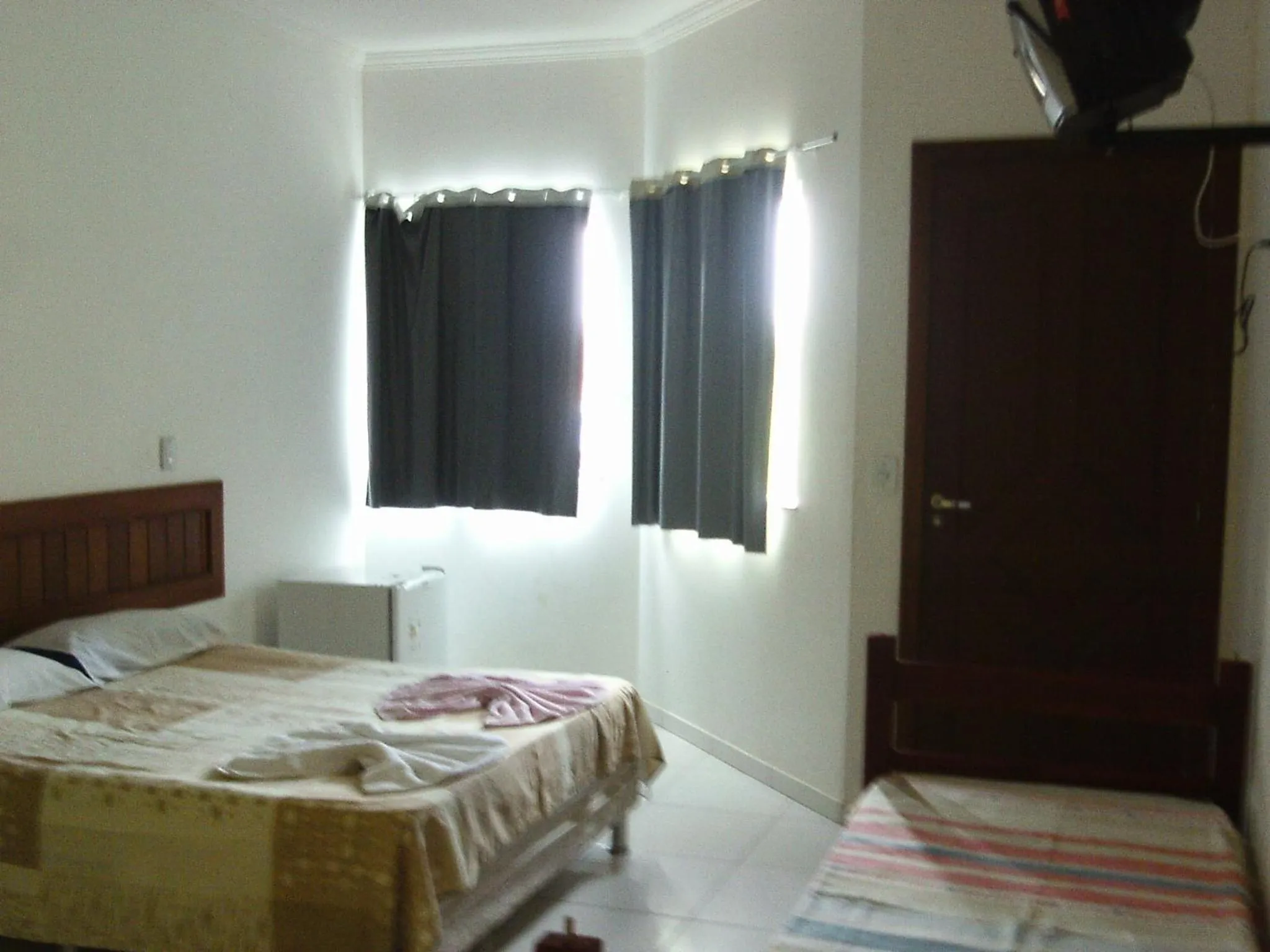 Bed in Pousada Lua de Tomate