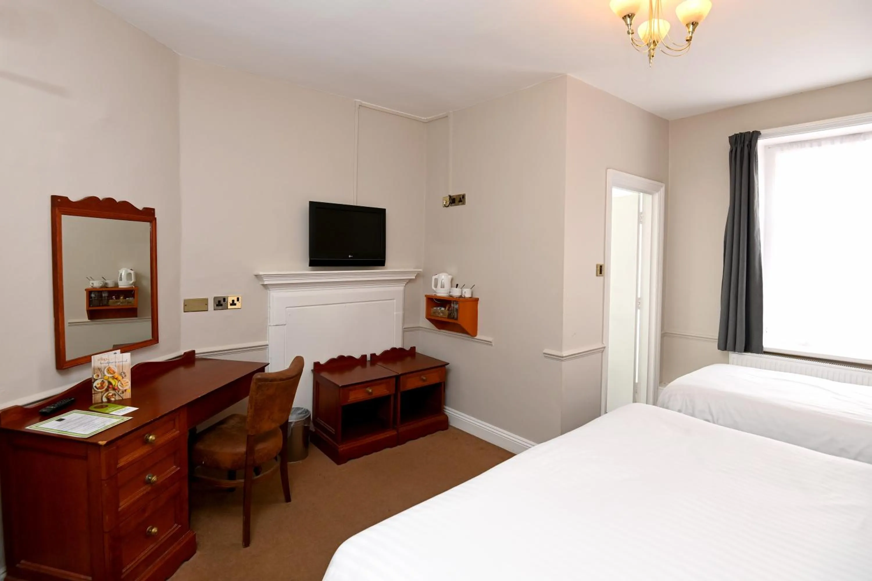 Bedroom, Bed in Original White Hart, Ringwood by Marston's Inns
