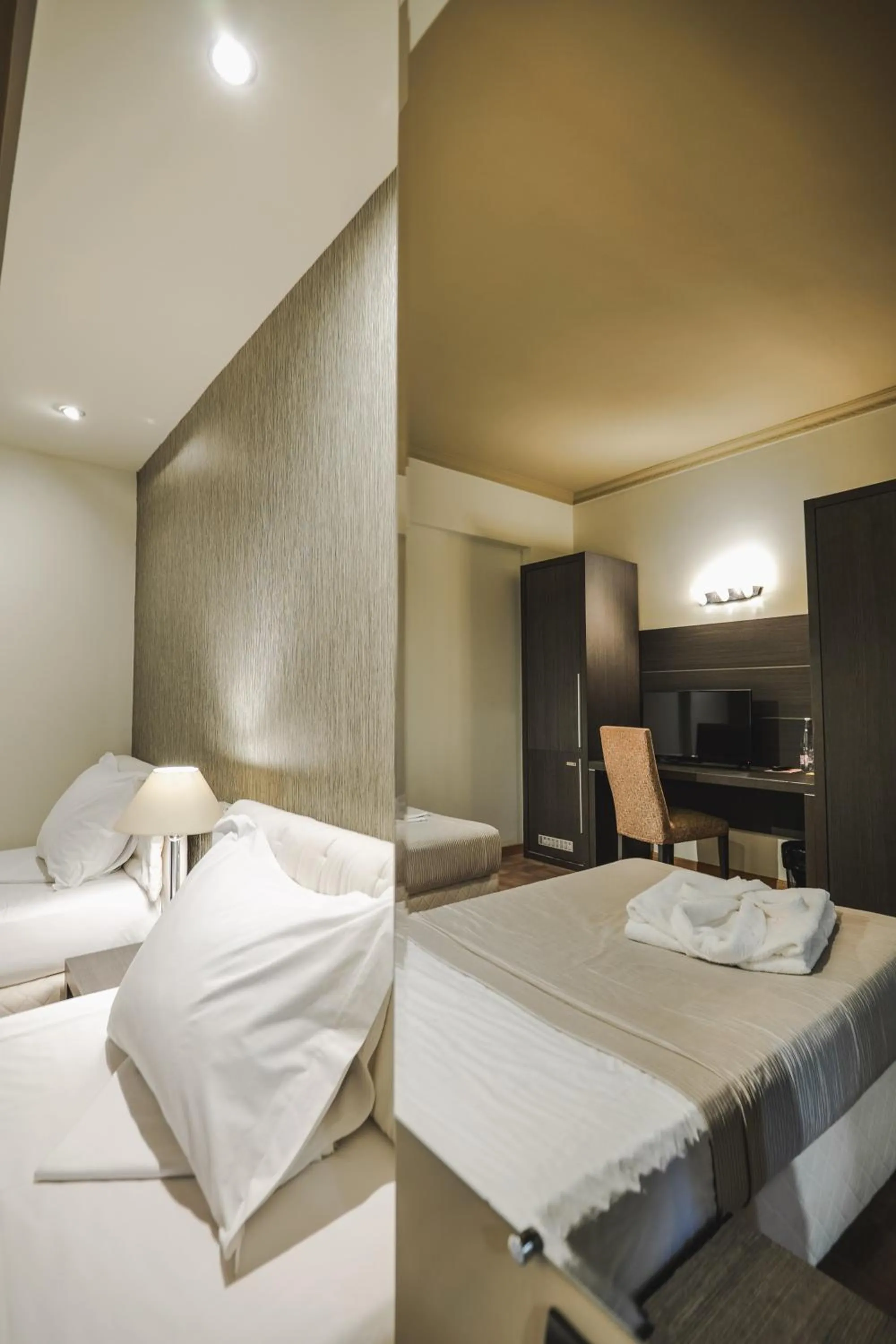 Bed in Rapo's Resort Hotel