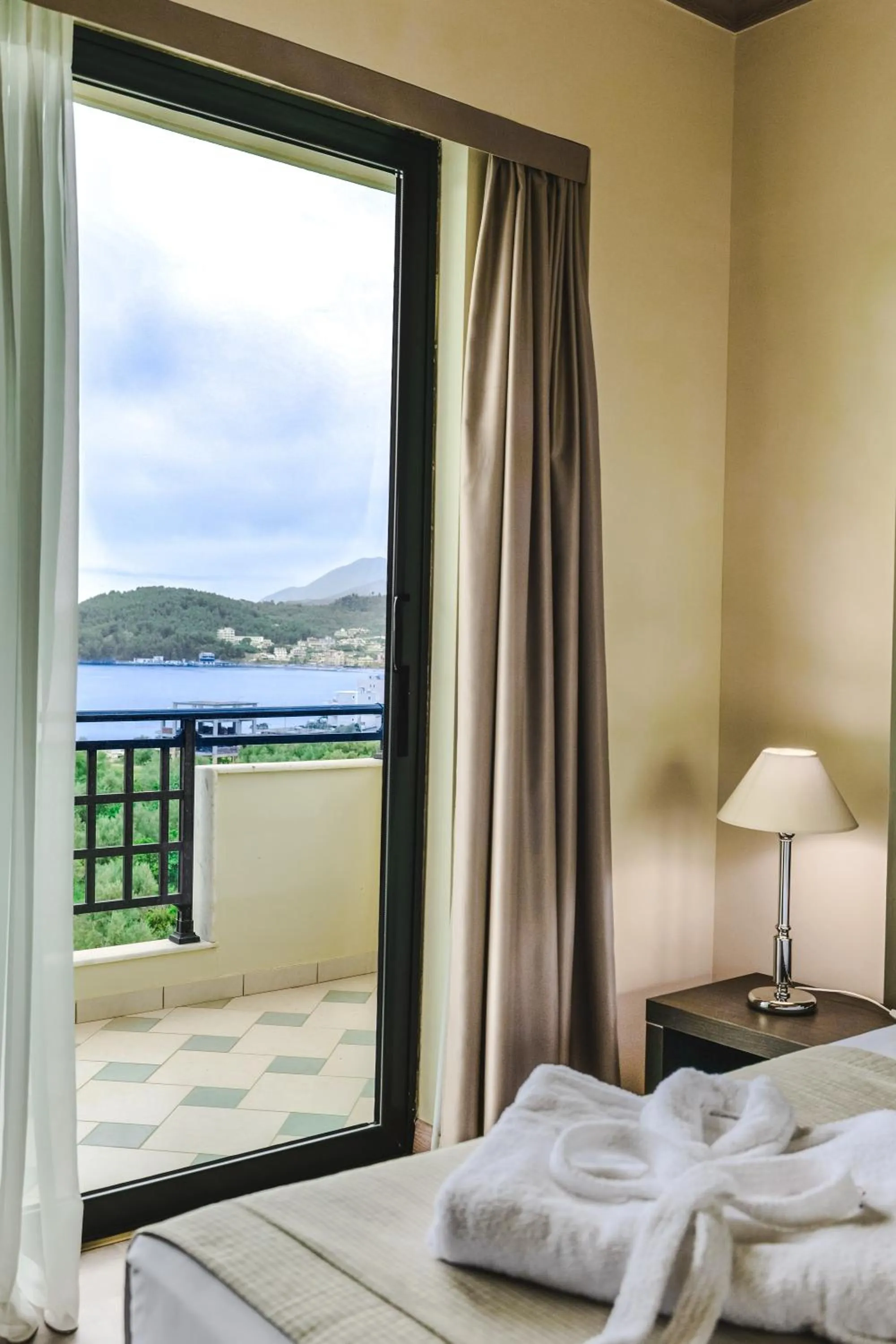 Balcony/Terrace, Bed in Rapo's Resort Hotel