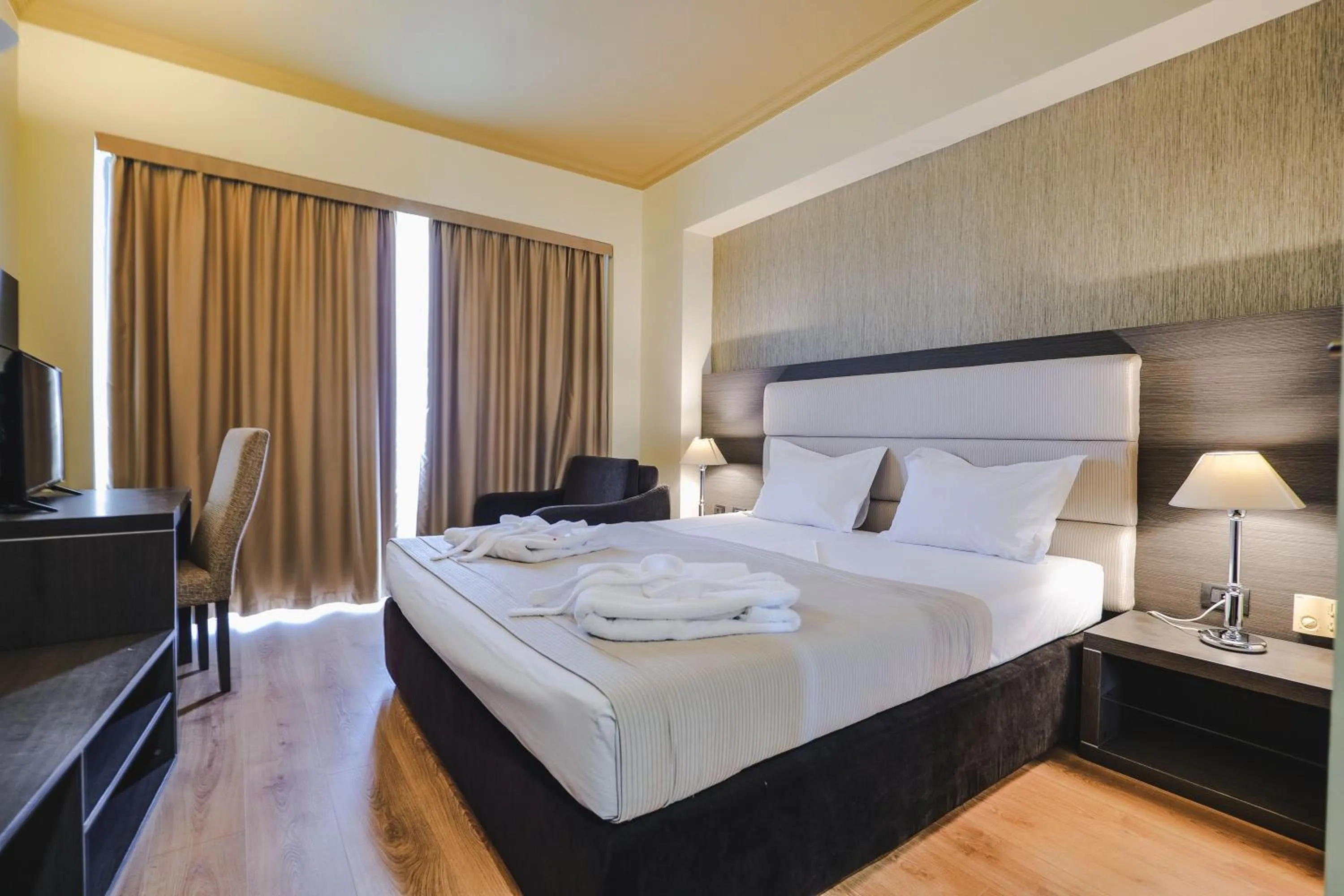 Bed in Rapo's Resort Hotel