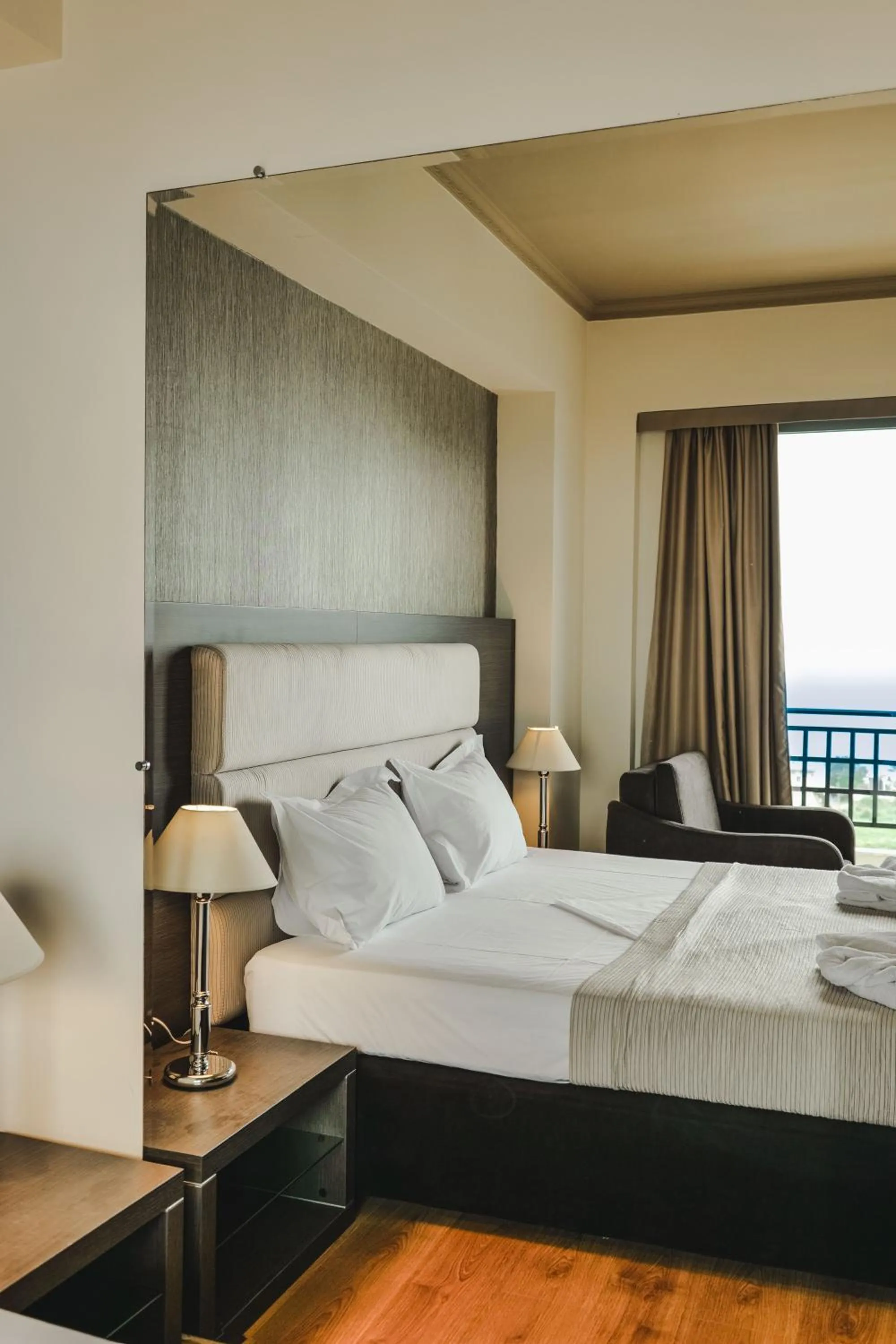 Bed in Rapo's Resort Hotel