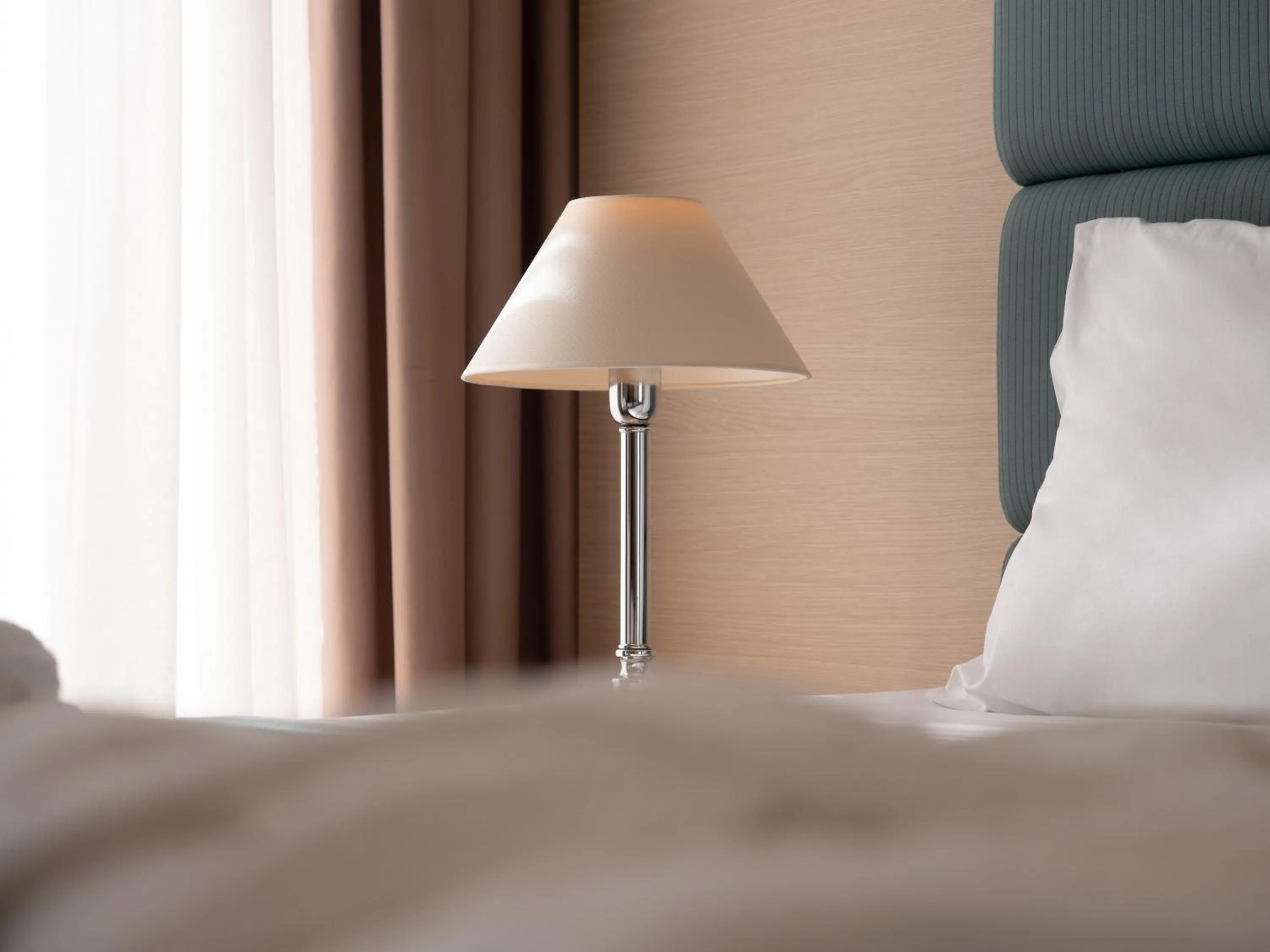 Bed in Rapo's Resort Hotel