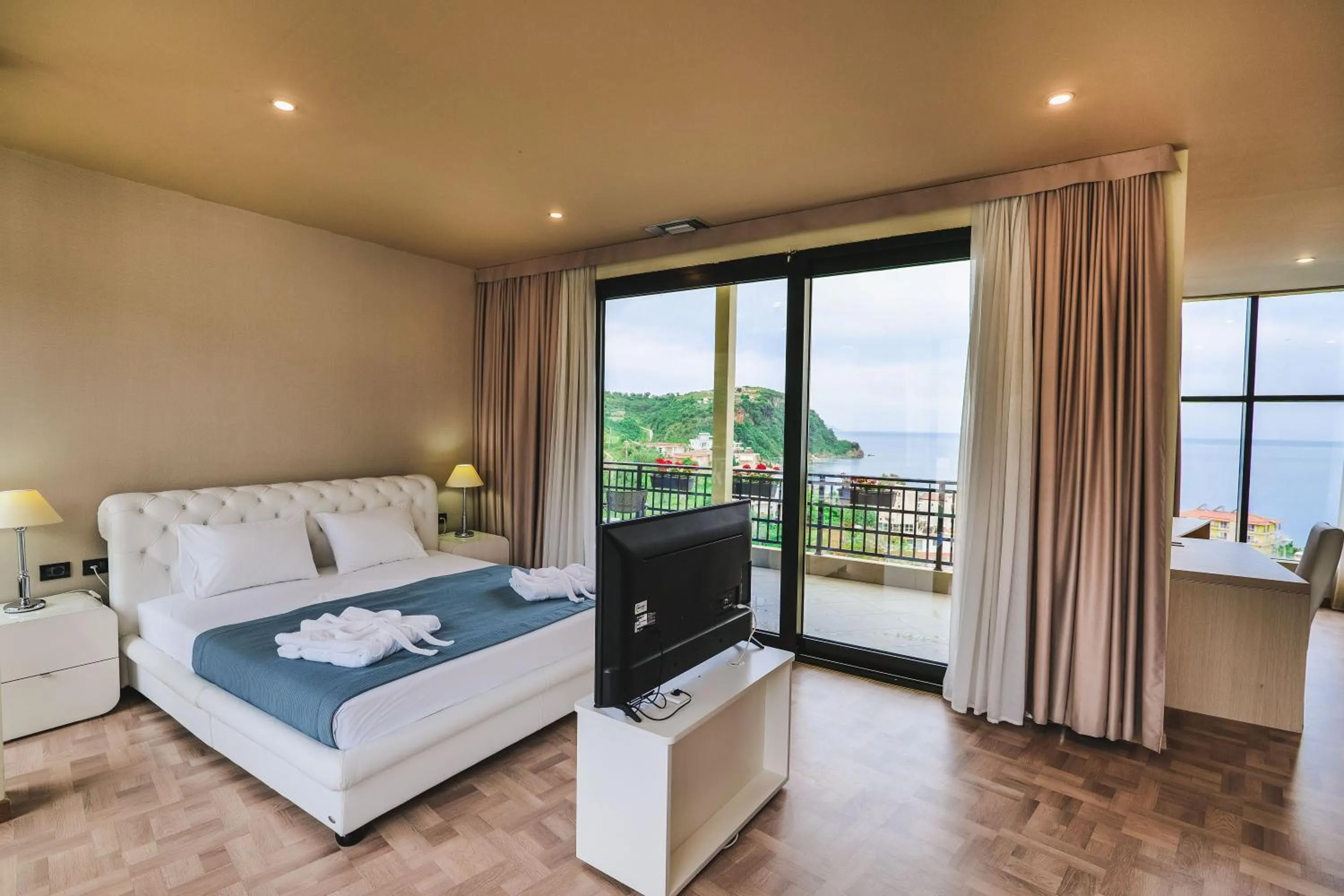 TV and multimedia, Bed in Rapo's Resort Hotel