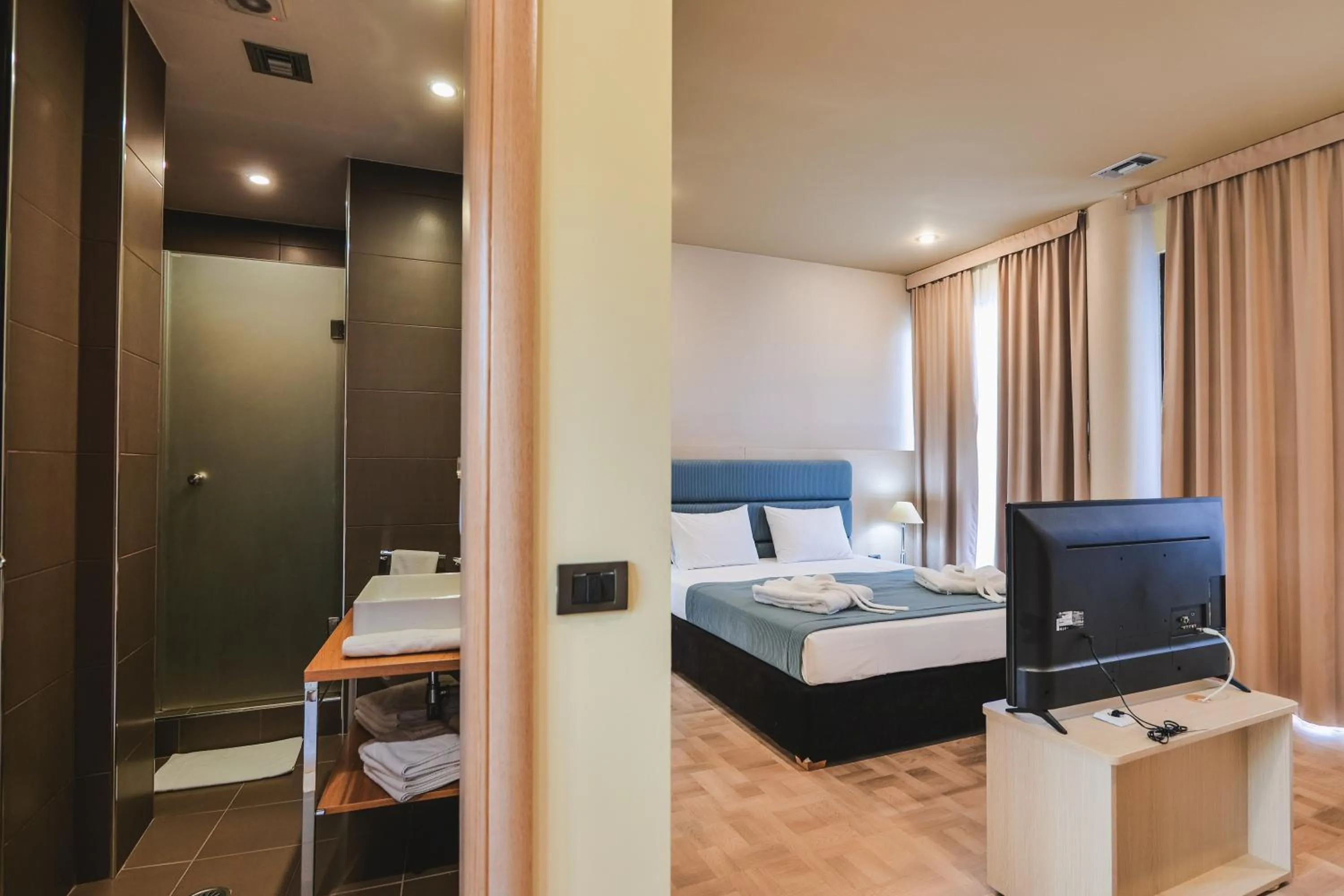 Bedroom, Bed in Rapo's Resort Hotel