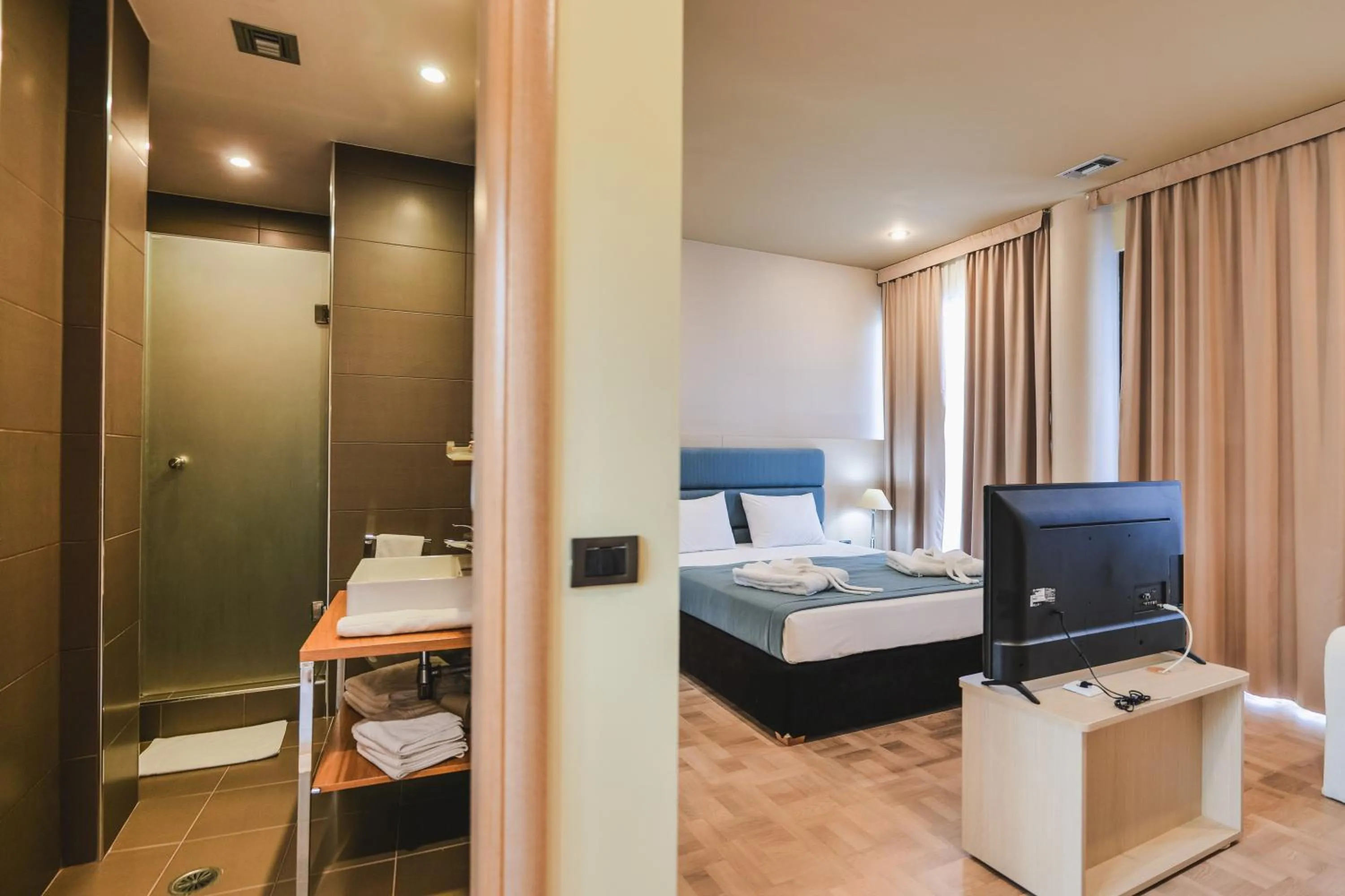 TV and multimedia, Bed in Rapo's Resort Hotel