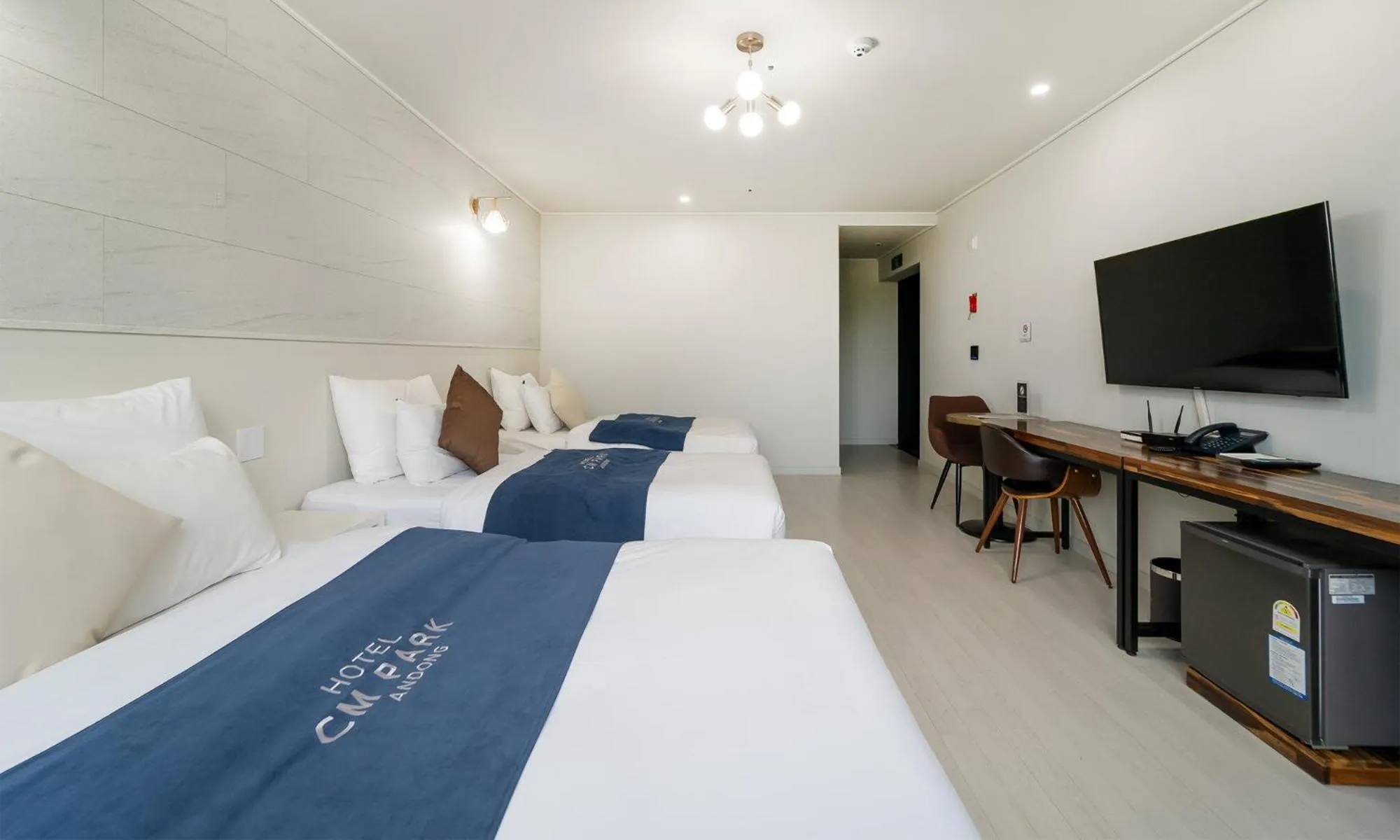 Bed in CM Park Hotel