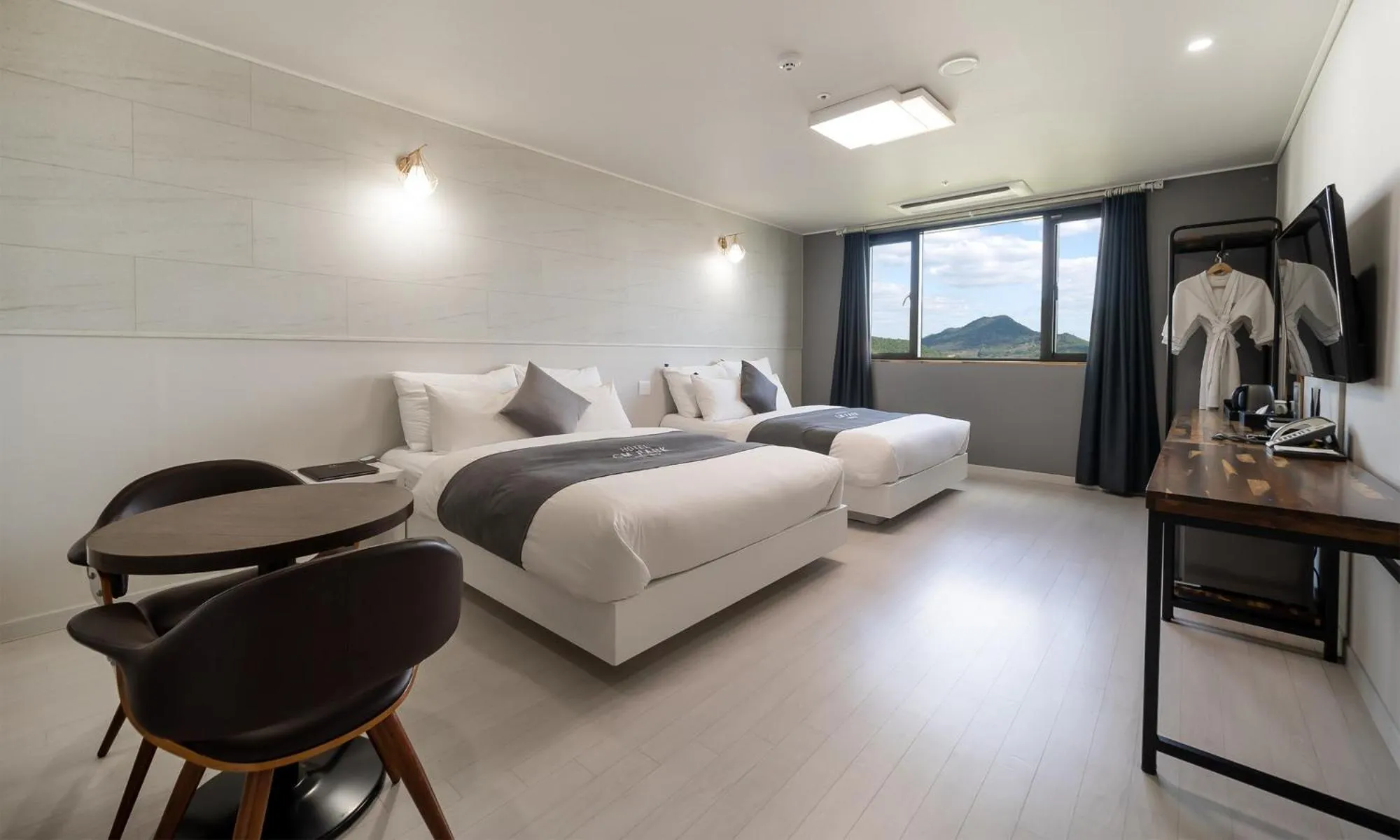 Bed in CM Park Hotel