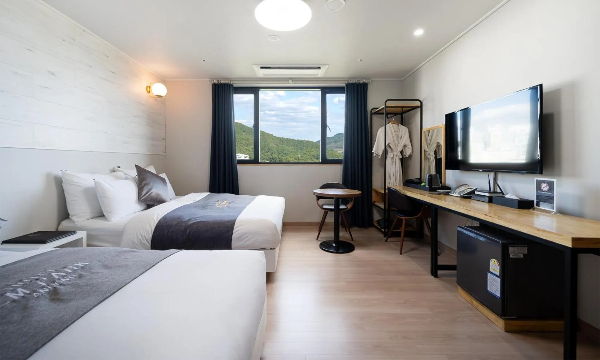 Bed in CM Park Hotel