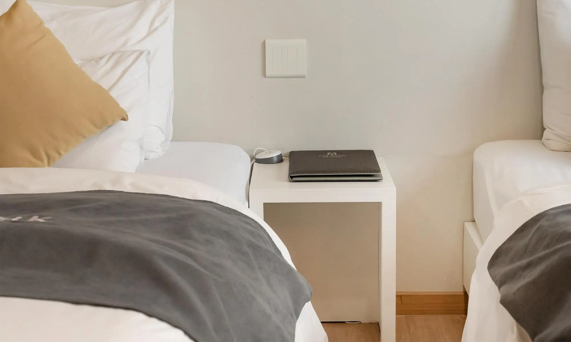 Bed in CM Park Hotel