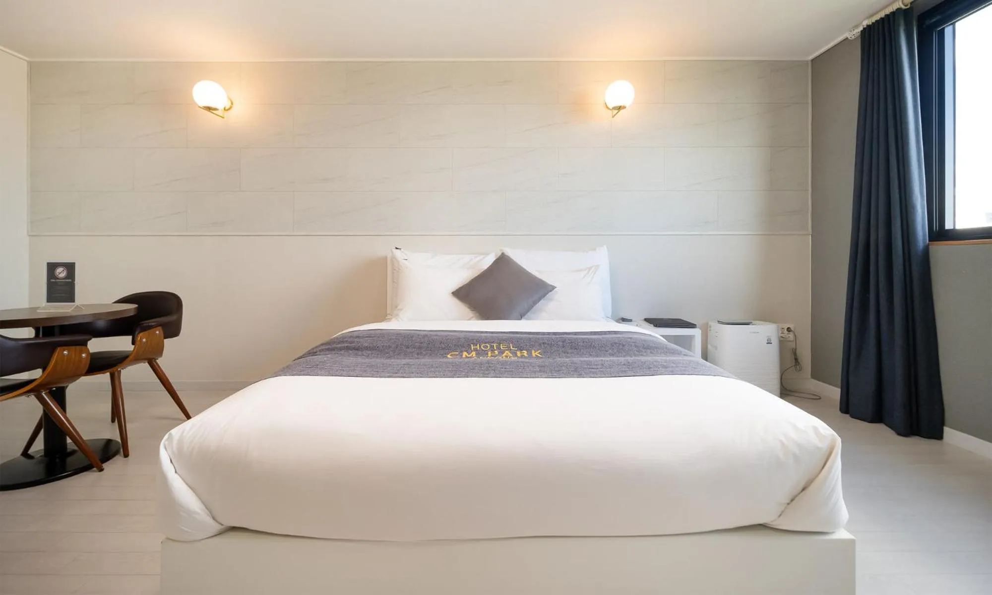 Bed in CM Park Hotel