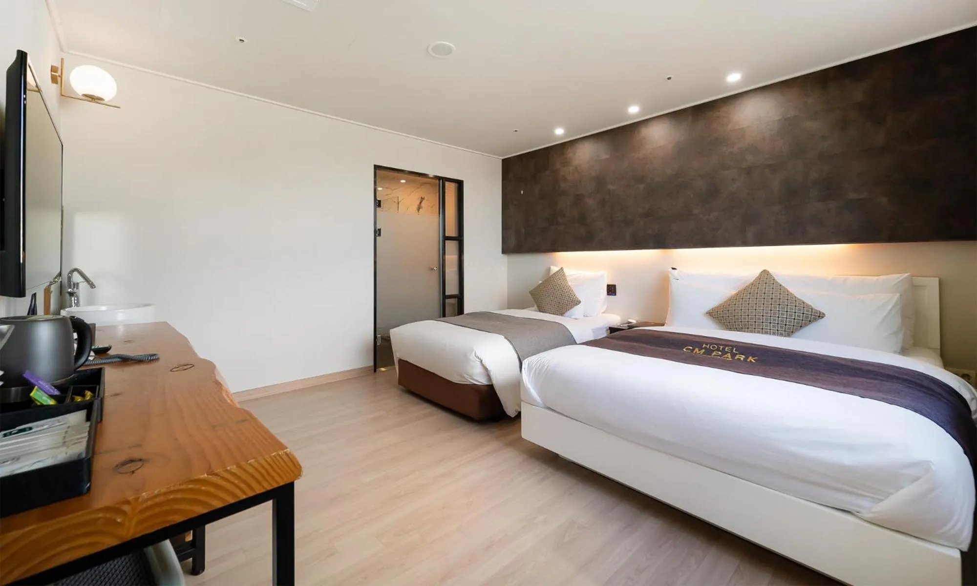 Bed in CM Park Hotel