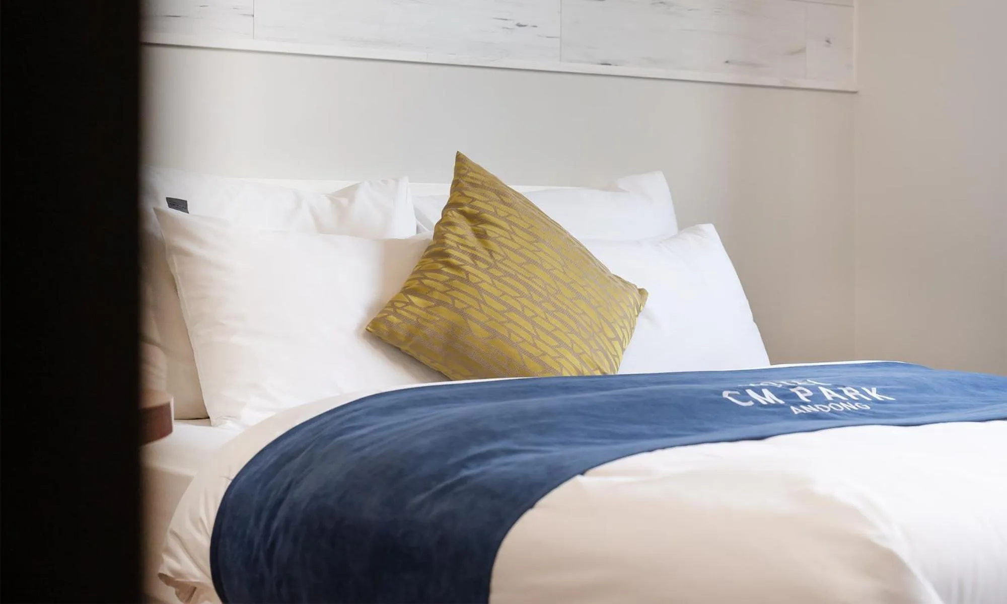 Bed in CM Park Hotel