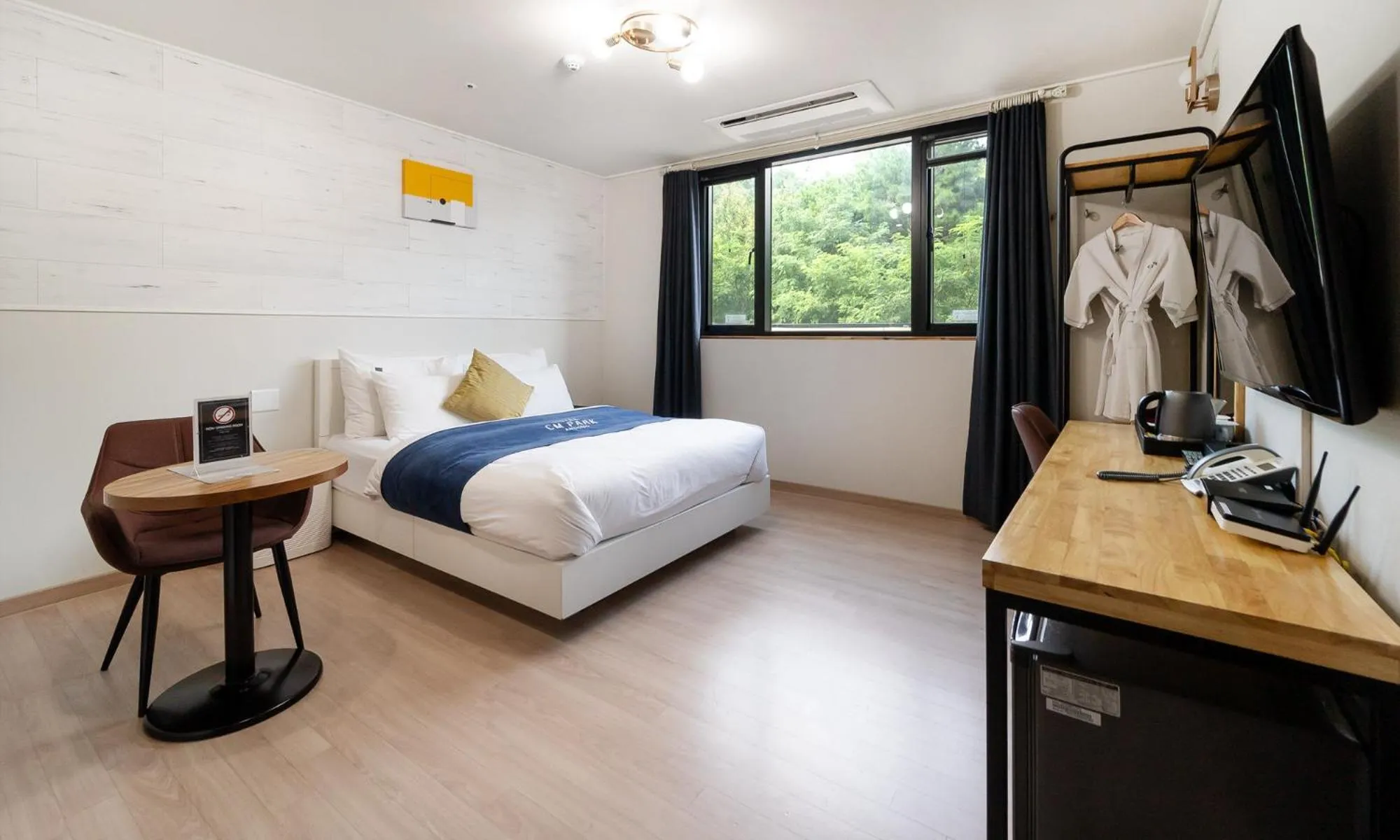 Bed in CM Park Hotel