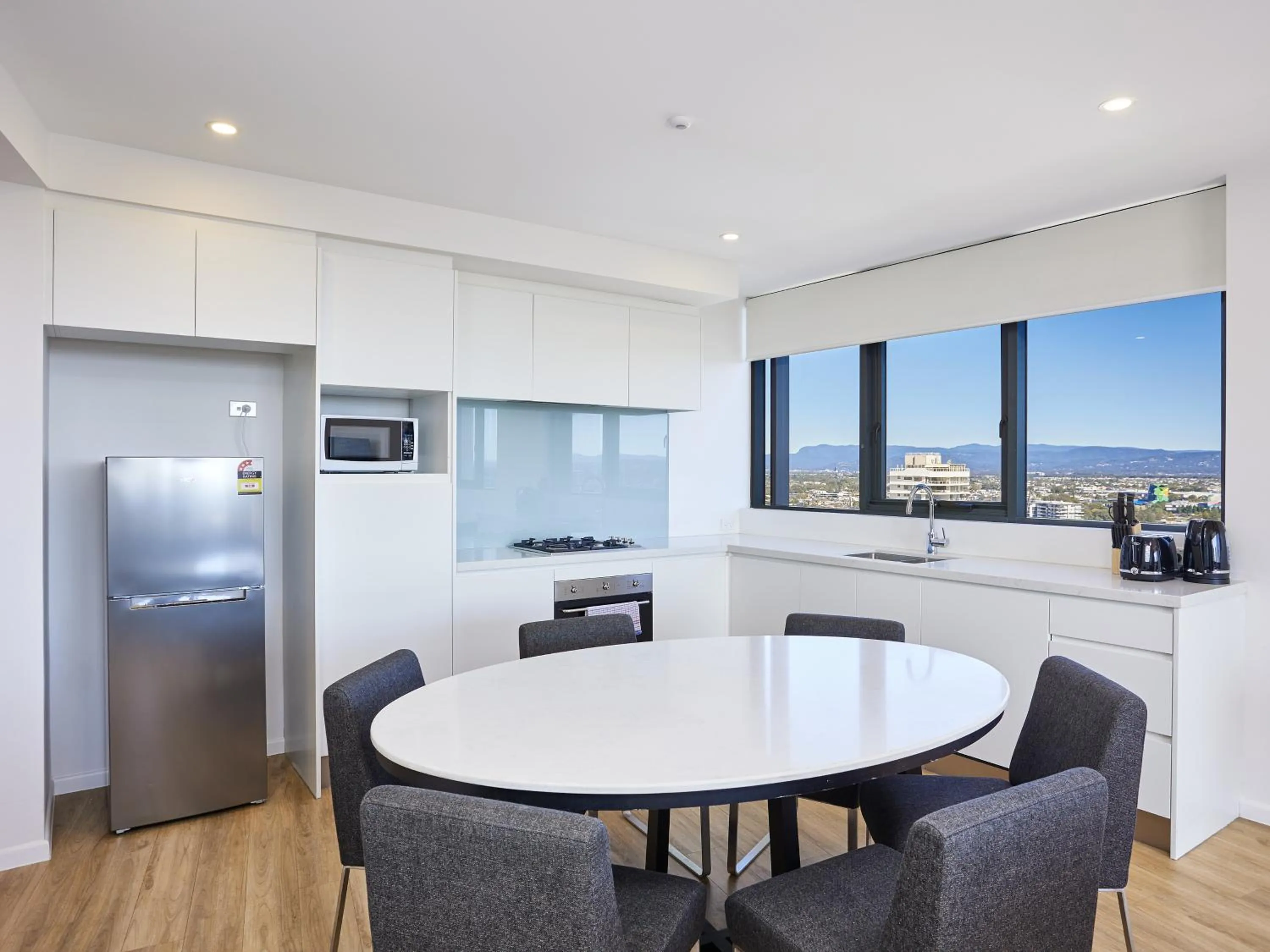 Kitchen or kitchenette in Ruby Gold Coast By Serain