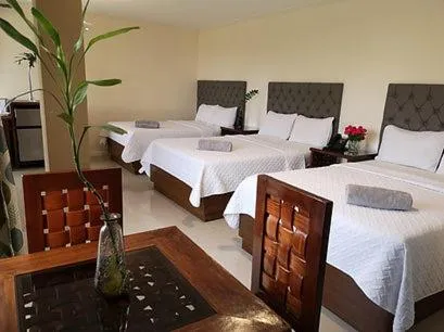 Bed in EM Royalle Hotel & Beach Resort