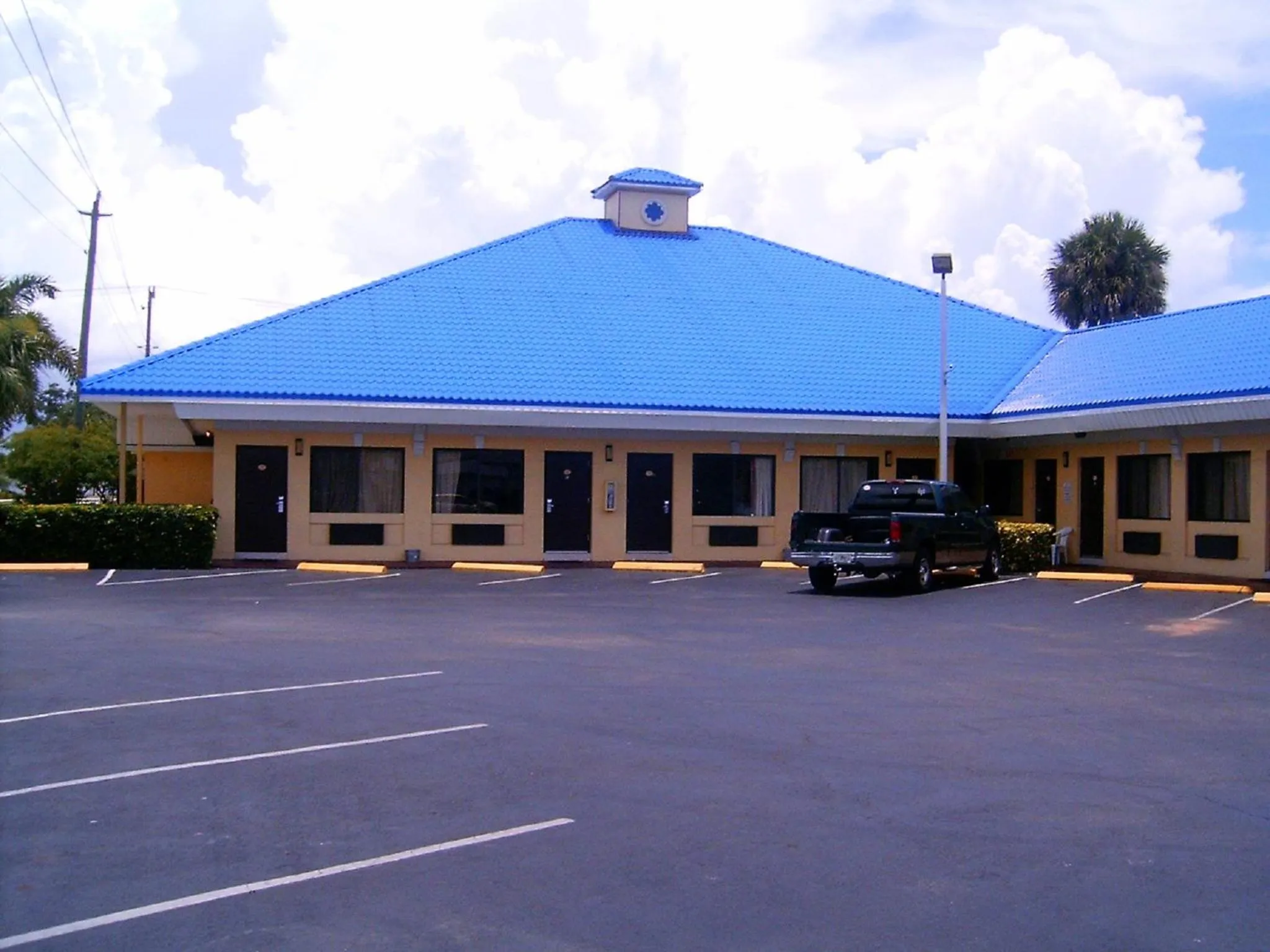 Property logo or sign in Budget Inn of Okeechobee