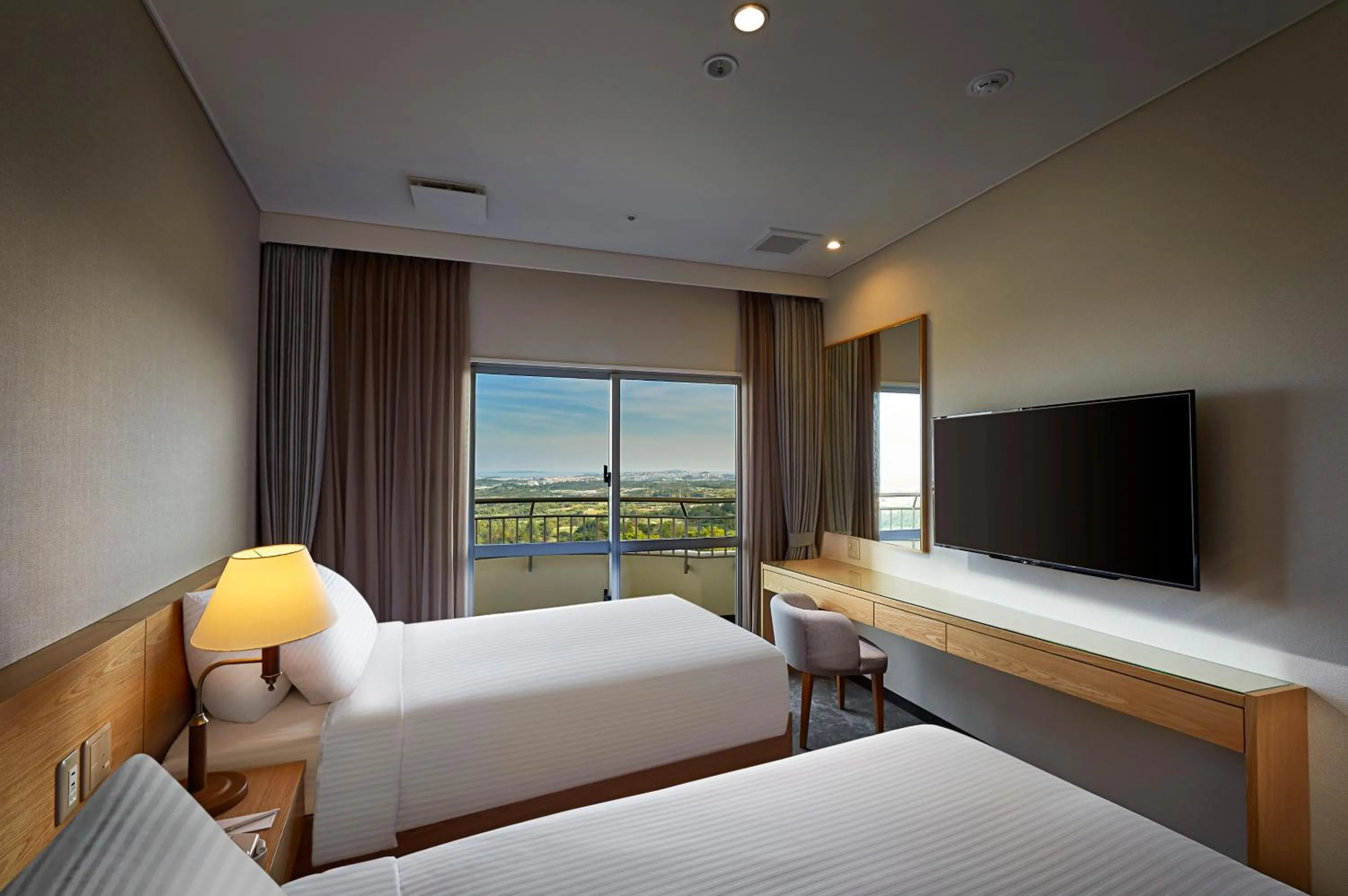 Photo of the whole room, Bed in ANA Crowne Plaza Resort Okinawa Uruma Hills By IHG