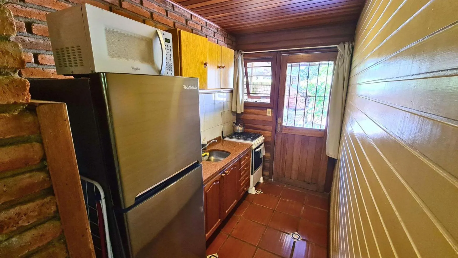 Kitchen or kitchenette in Complejo Cabañas Piriápolis