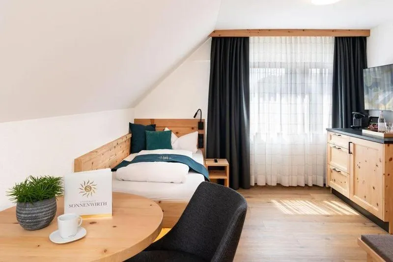 Photo of the whole room, Bed in Gästehaus Sonnenwirth