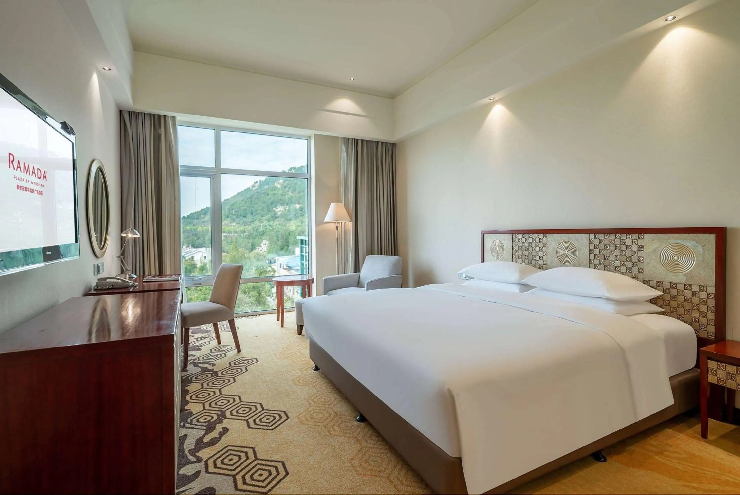 Photo of the whole room, Bed in Ramada Plaza By Wyndham Taian