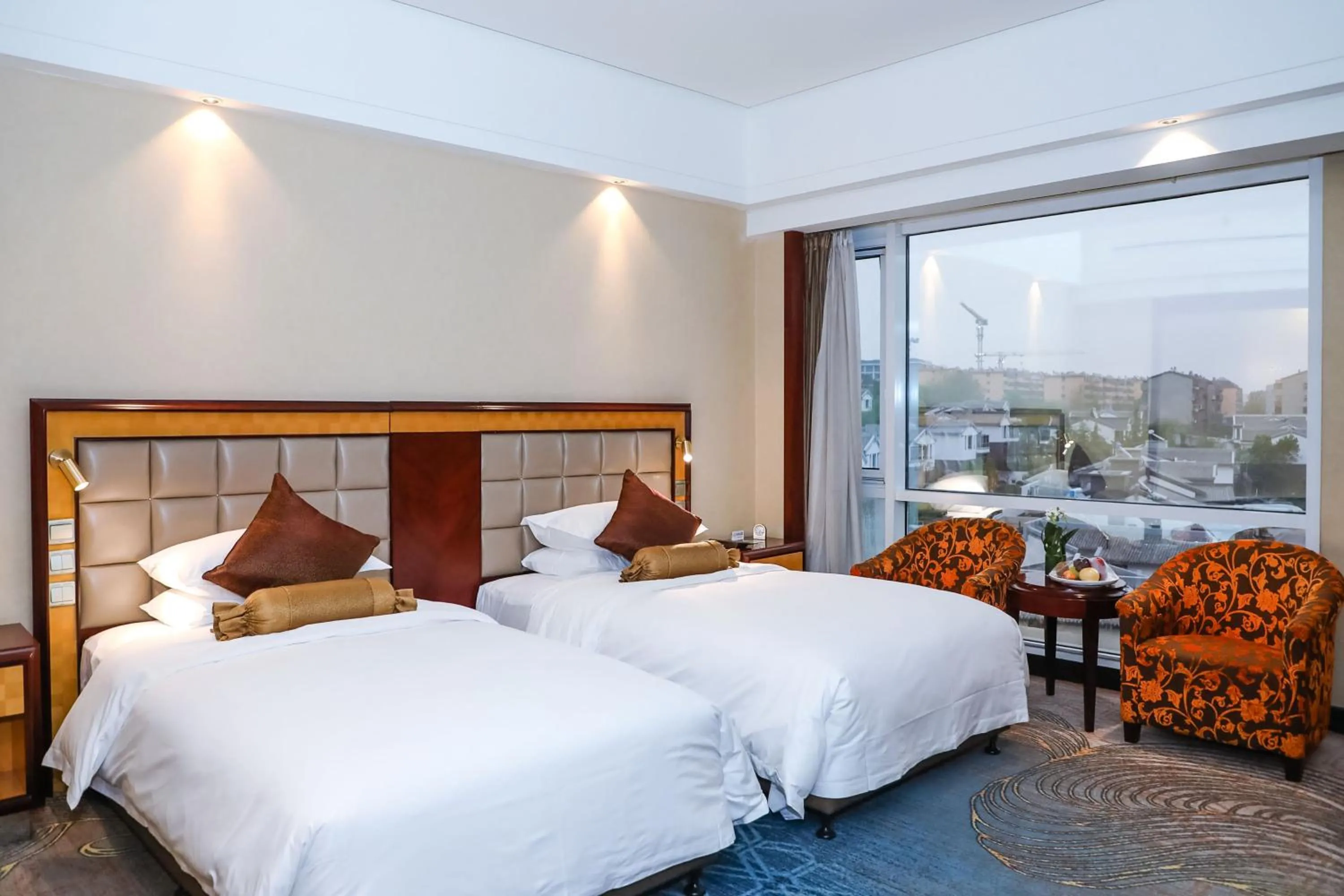 Living room, Bed in Ramada Plaza By Wyndham Taian