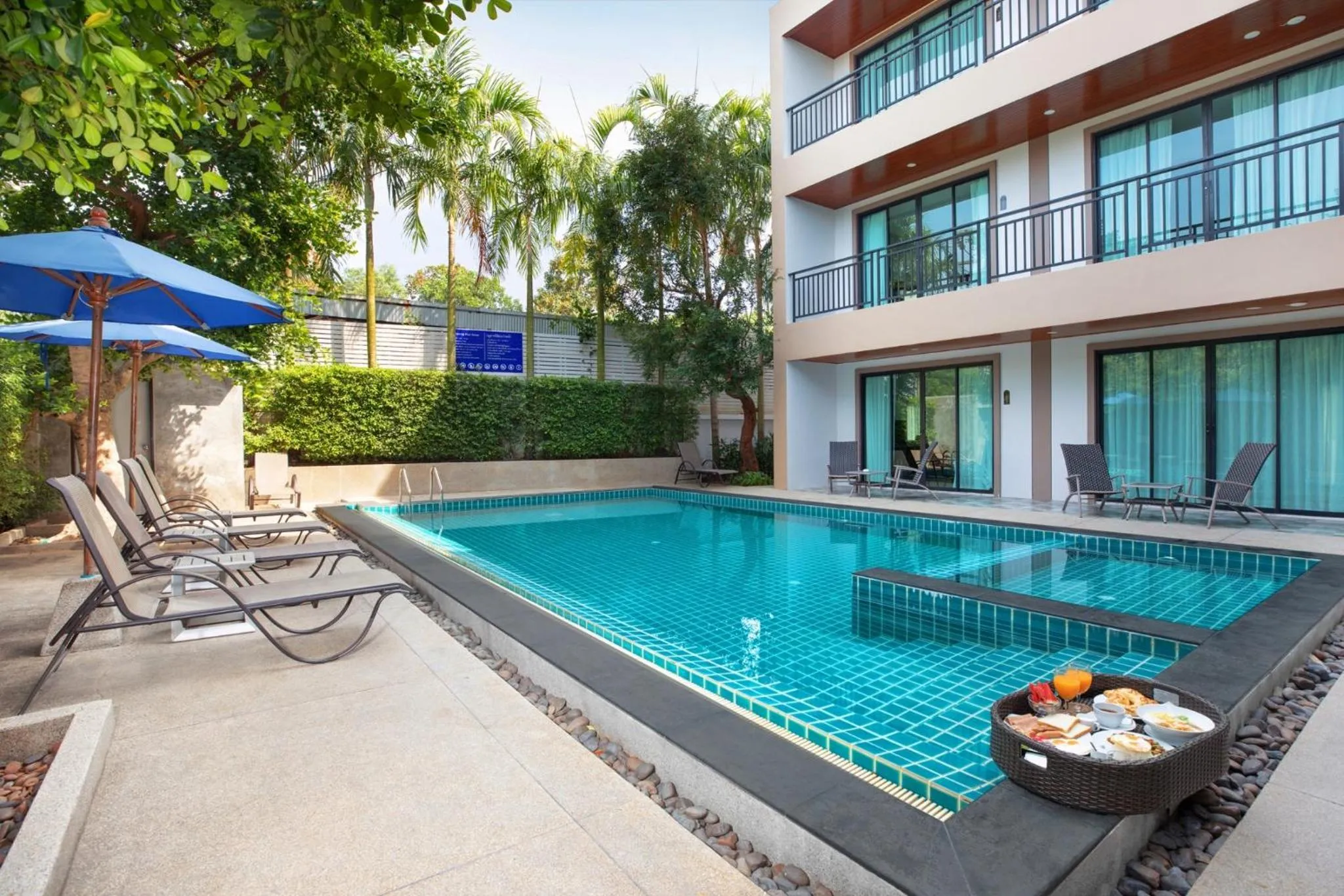 Pool view in The Bell Airport Phuket Hotel - SHA Extra Plus
