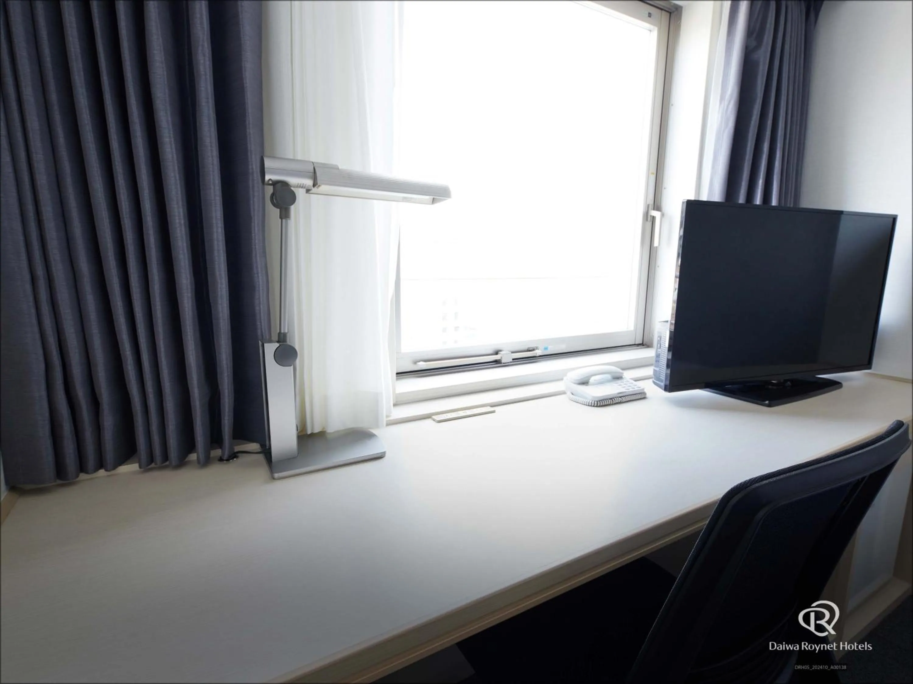 Seating area in Daiwa Roynet Hotel Osaka-Uehonmachi