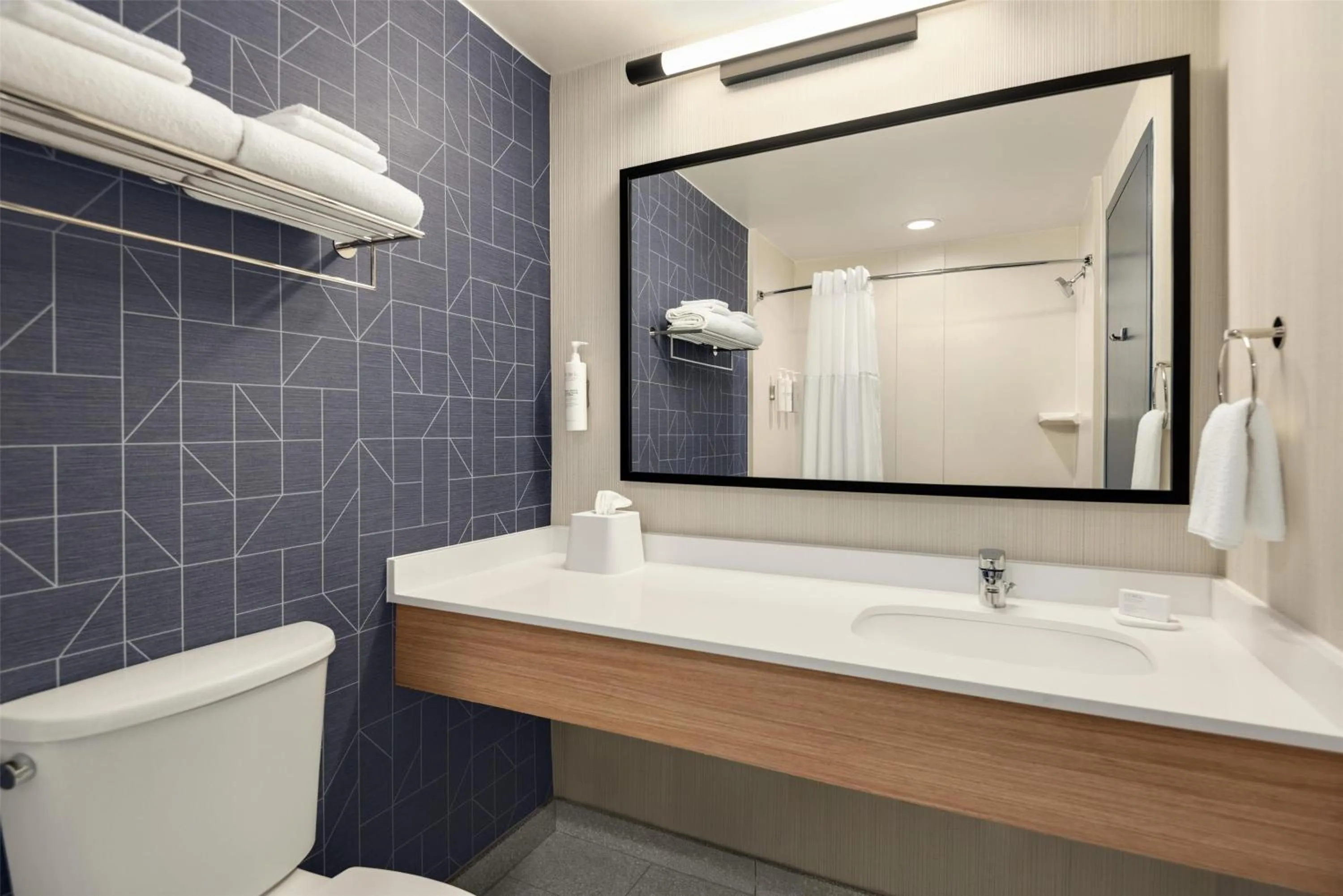 Bathroom in Spark by Hilton Woburn Boston