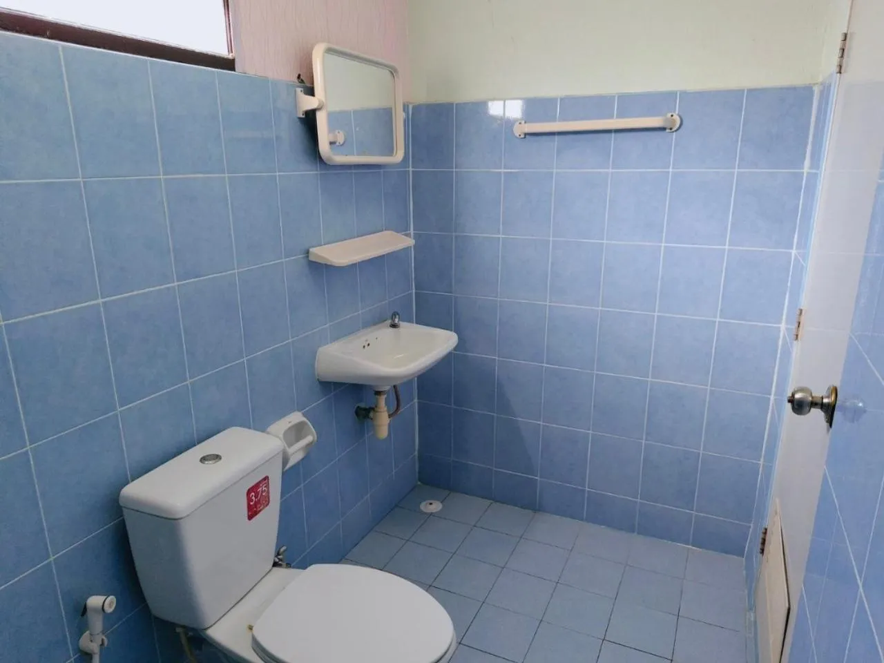 Toilet in Pooma Resort