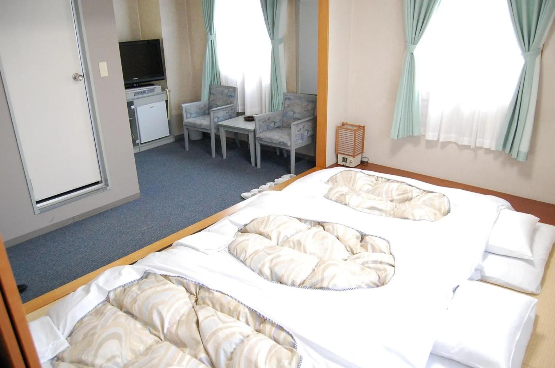 Bed in Seagrande Shimizu Station Hotel