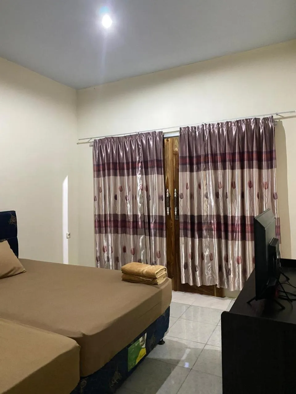 Bed in Family Garden Homestay