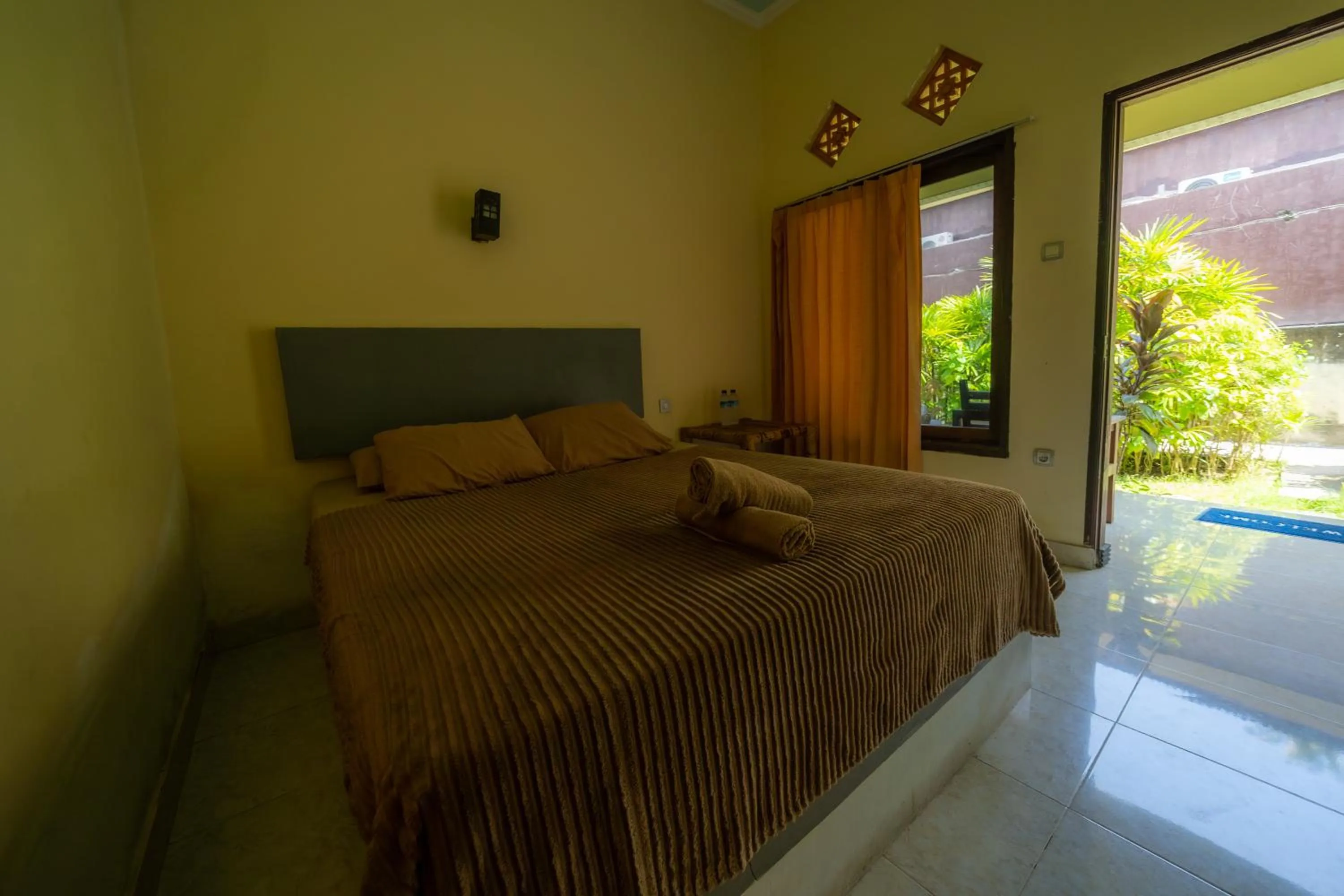 Bed in Family Garden Homestay