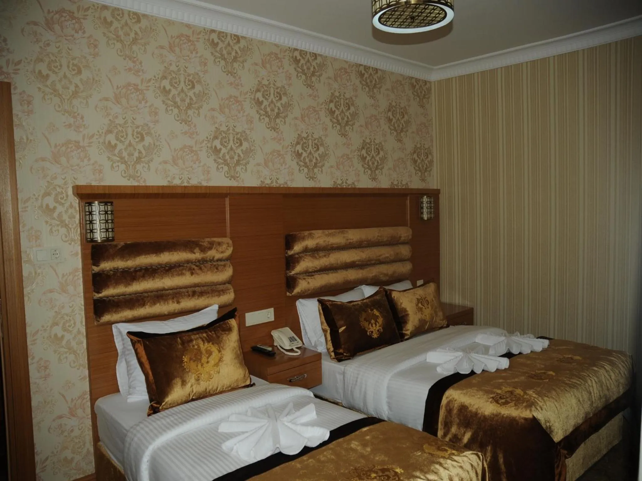 Bedroom in Alfa Hotel