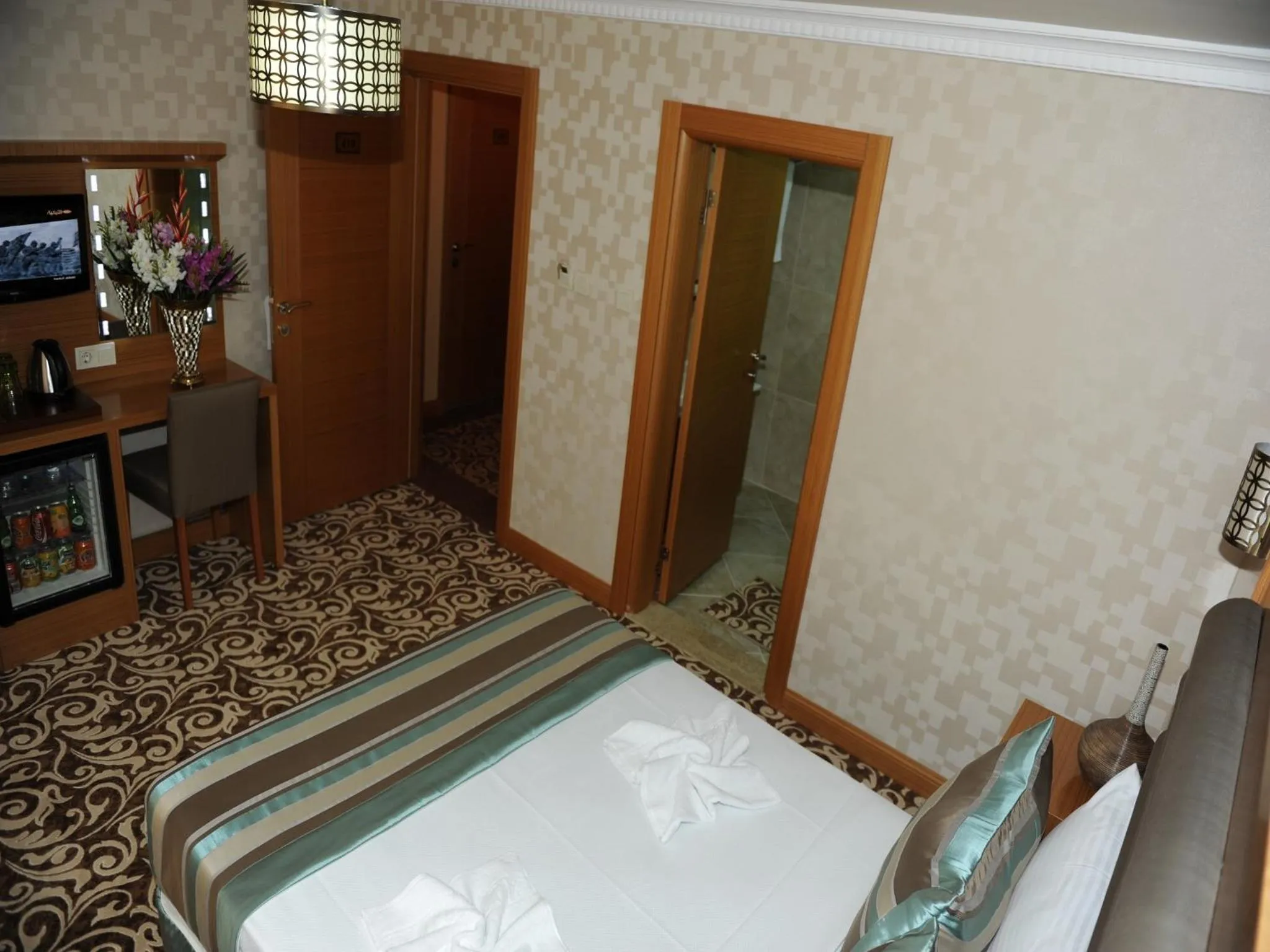 Bedroom in Alfa Hotel