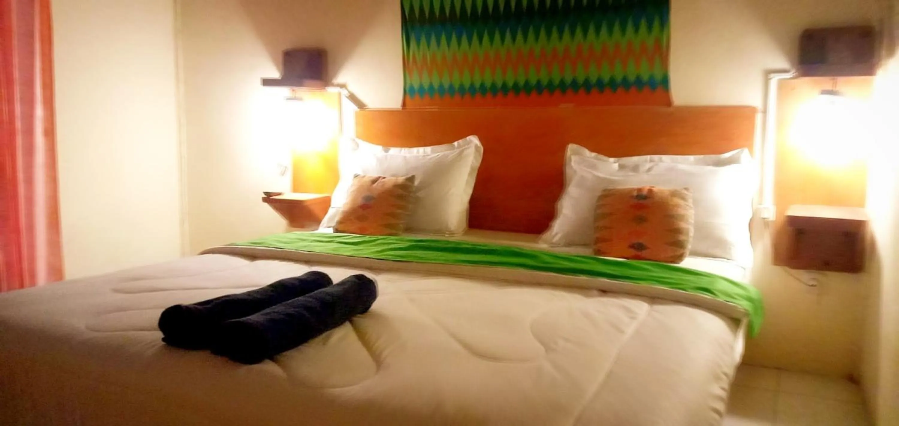 Bed in Angin Mamiri Rinjani Cottages And Restaurant