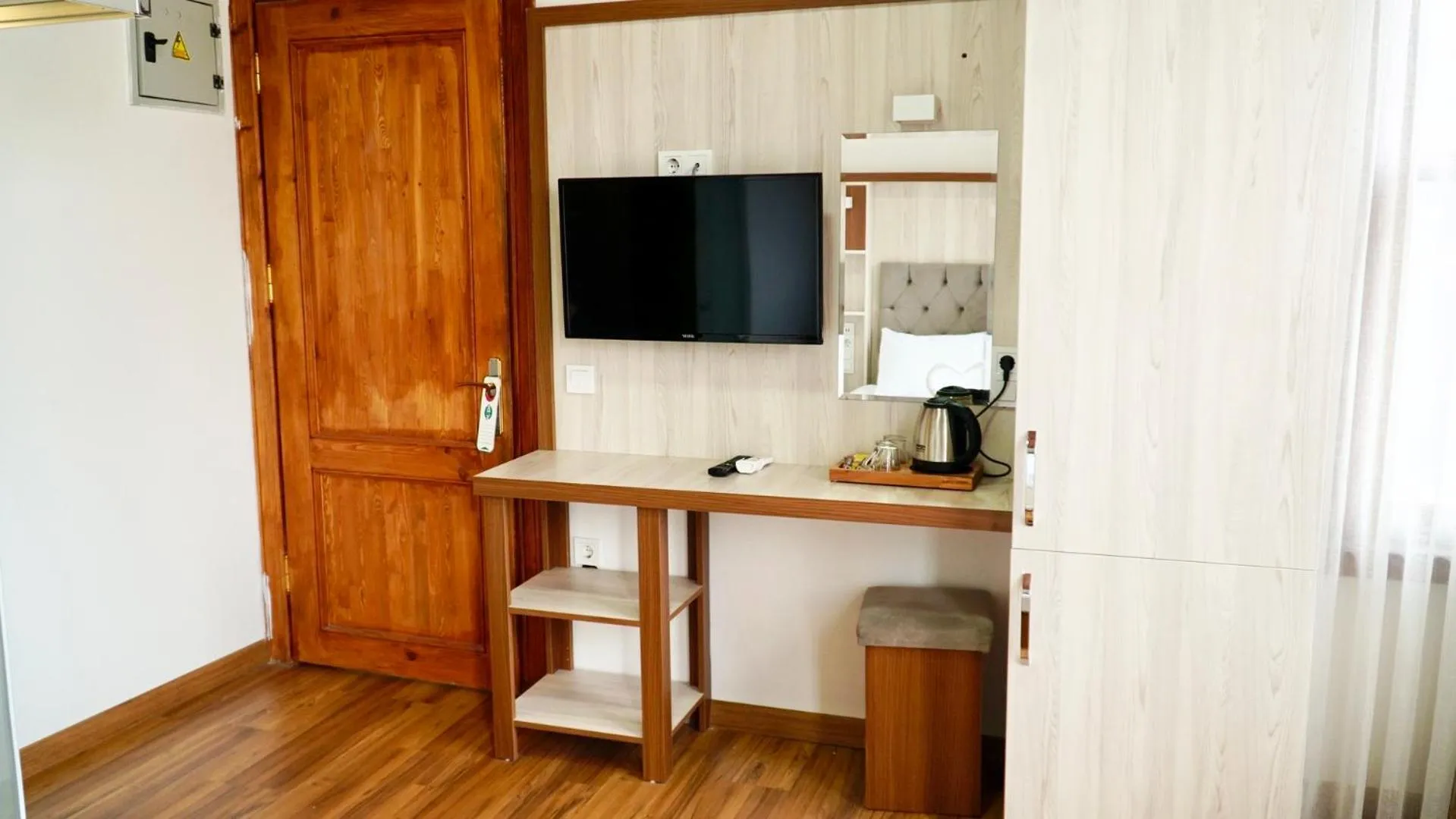 TV and multimedia in QONAQ HOTEL & SUITES