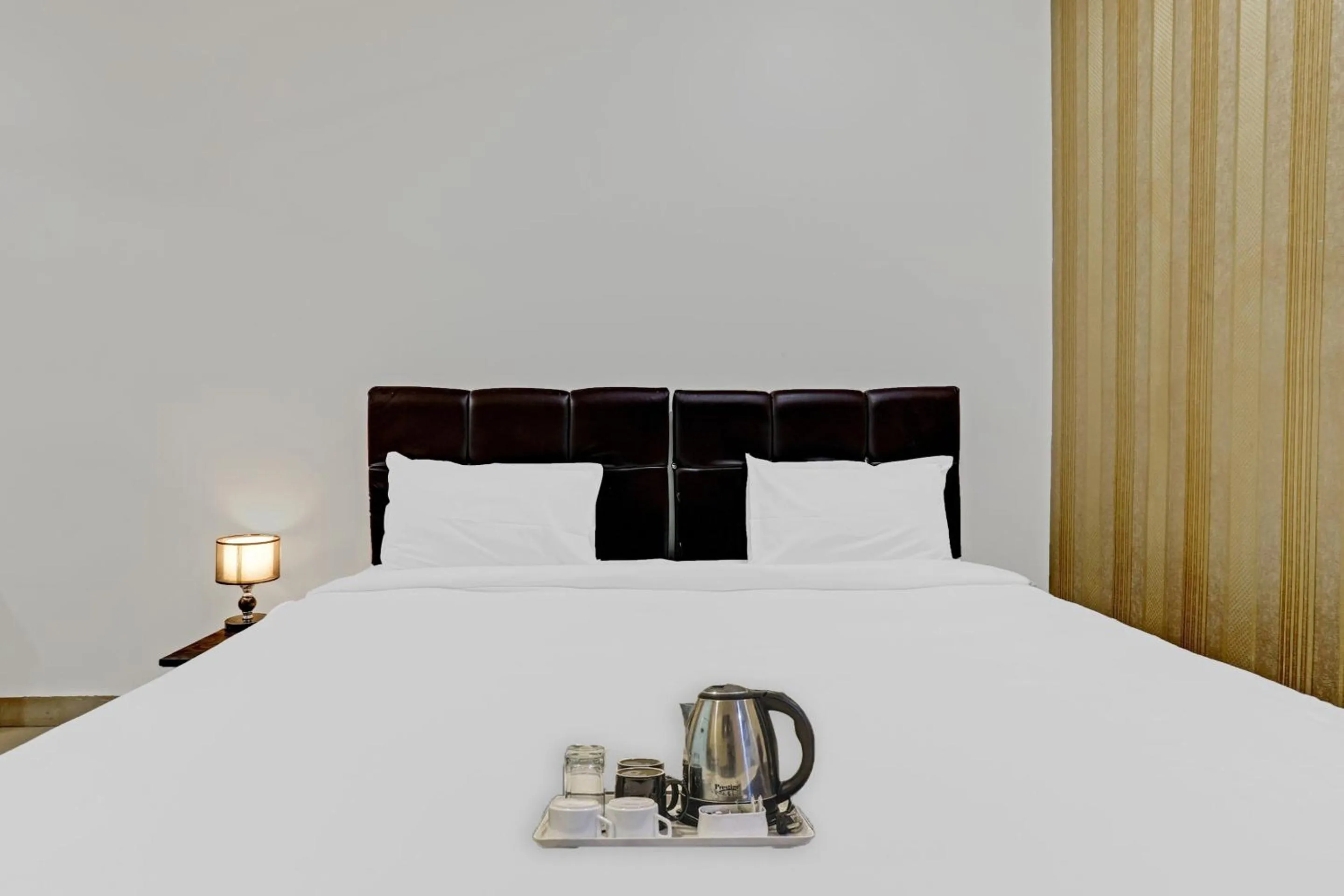 Bedroom in Hotel O Happy Stay