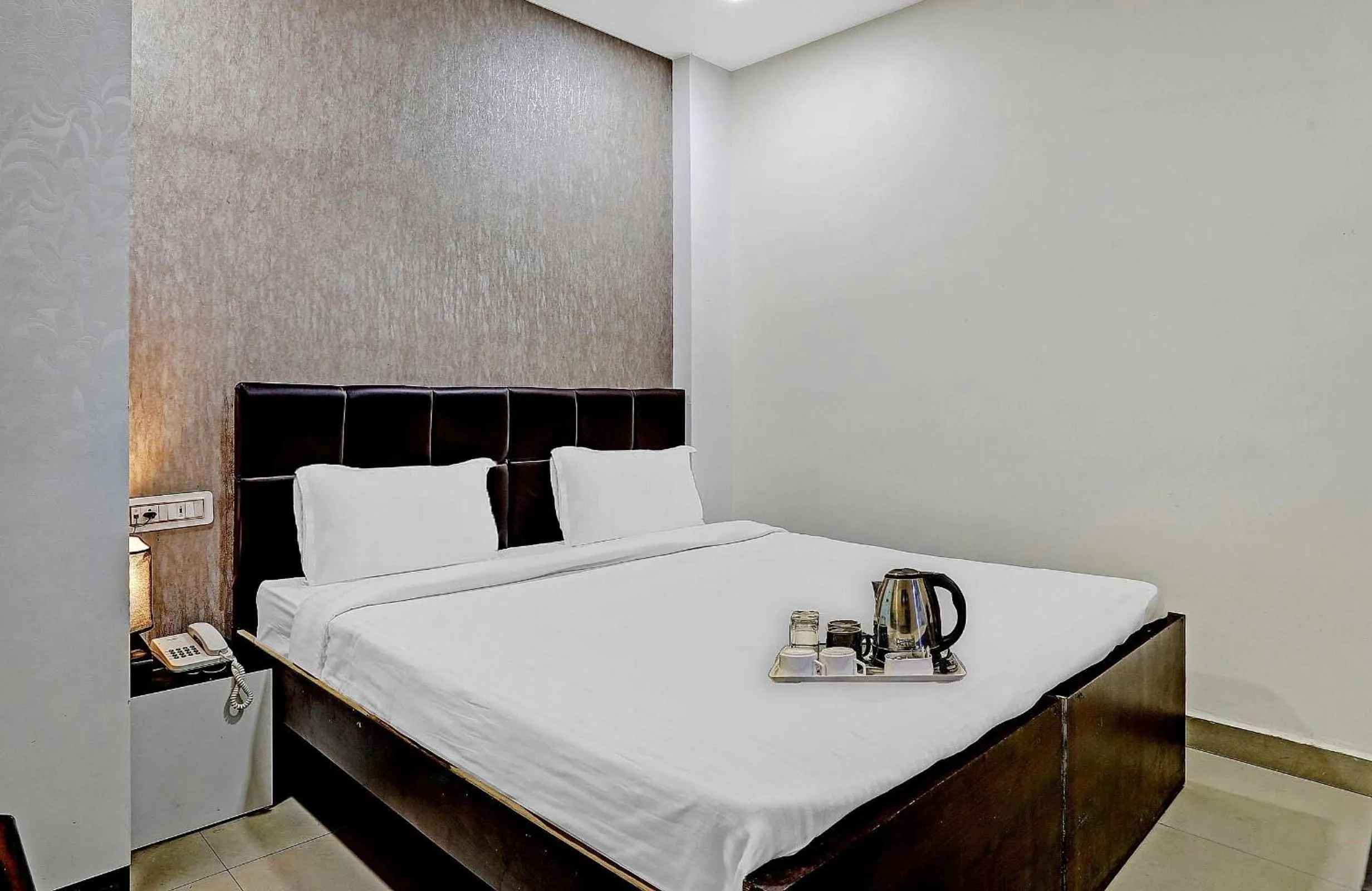 Bedroom in Hotel O Happy Stay