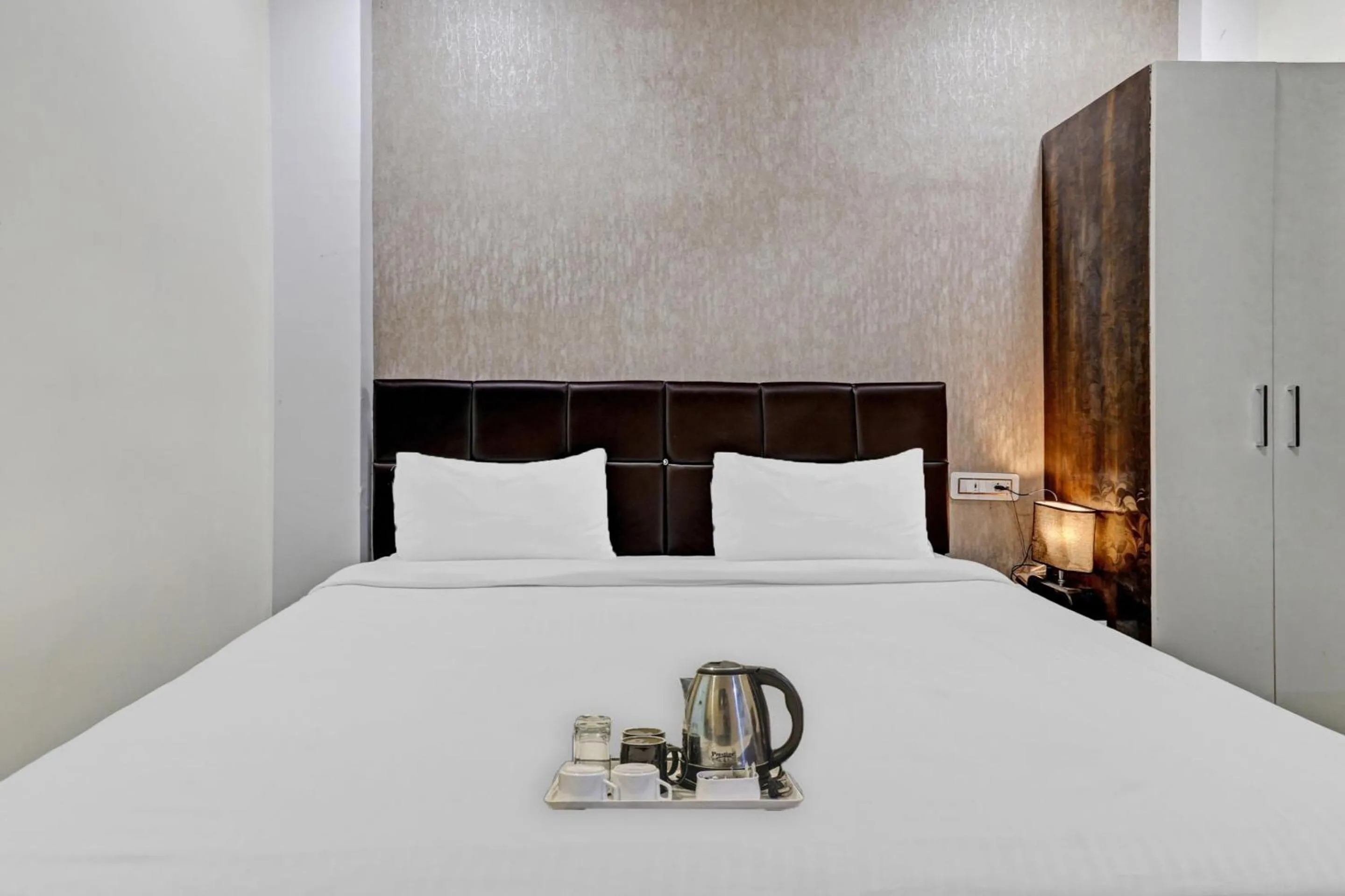 Bedroom in Hotel O Happy Stay