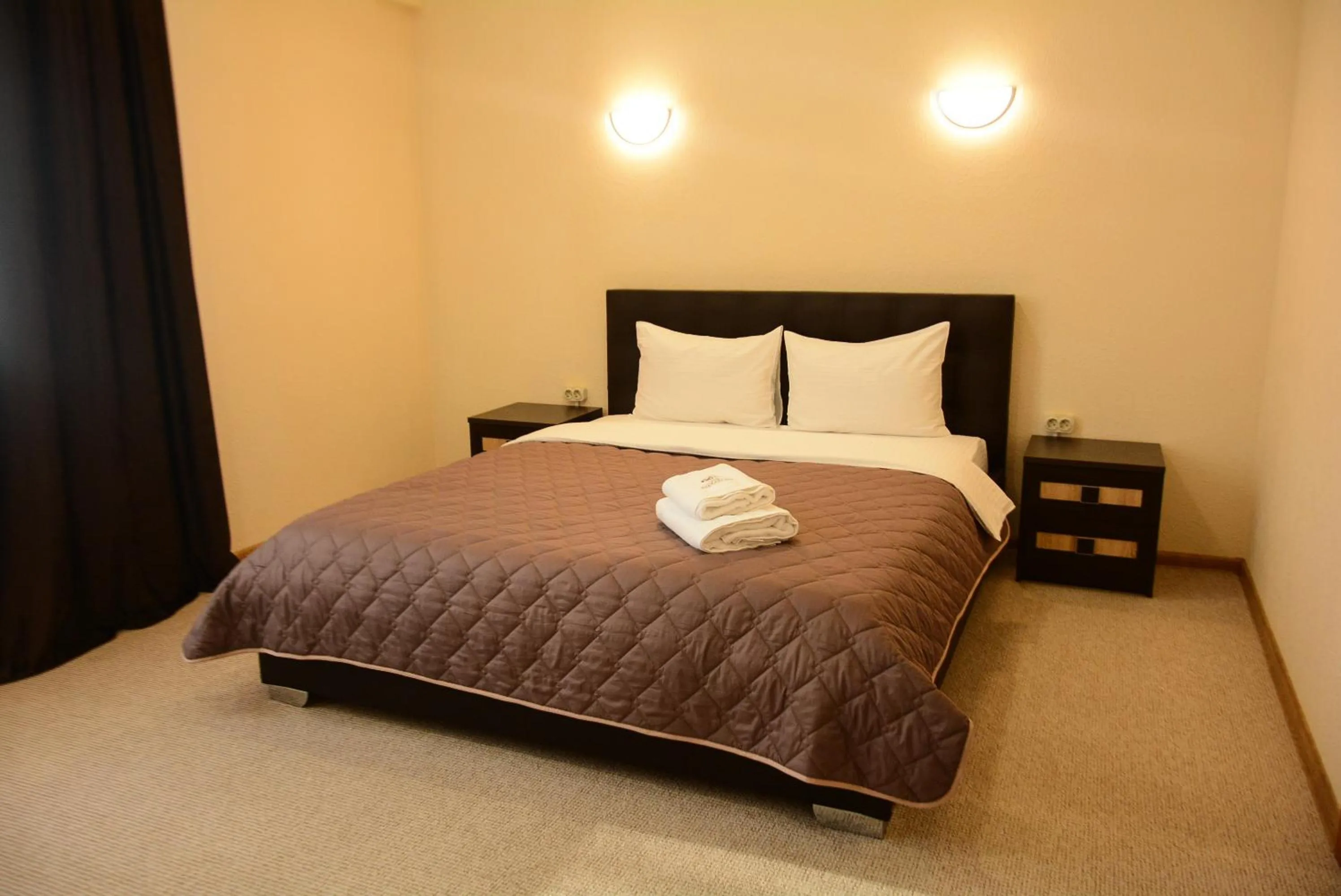 Bed in Hotel Voskresensky