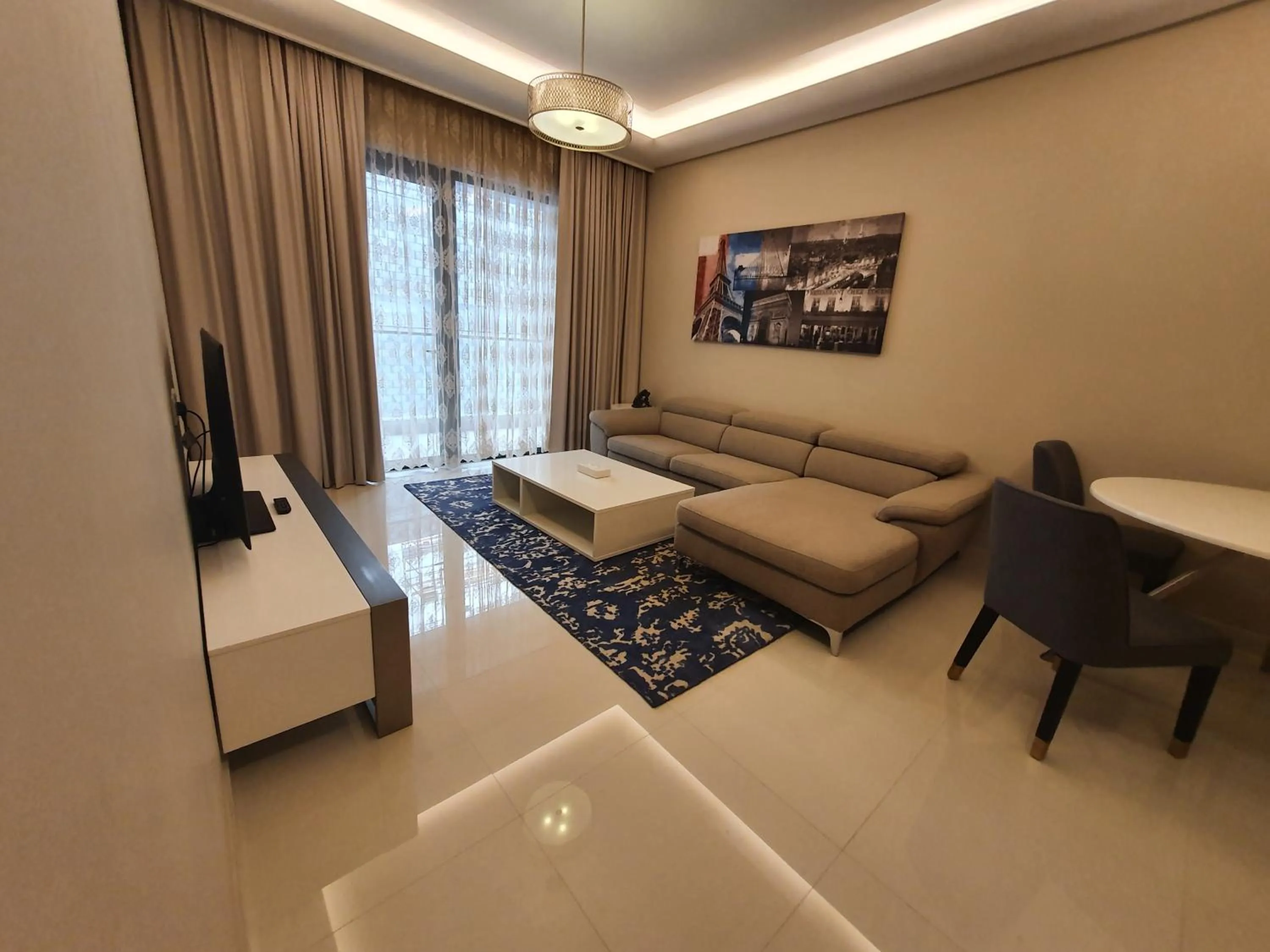 Living room, Bed in Sunday Luxury Downtown Adliya Formerly Jewel Hotel