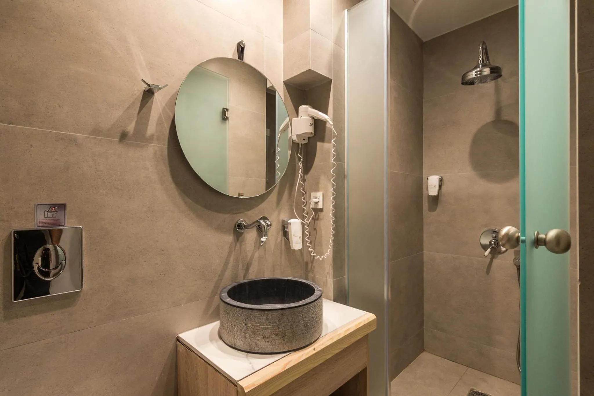 Shower in Livikon by the Sea