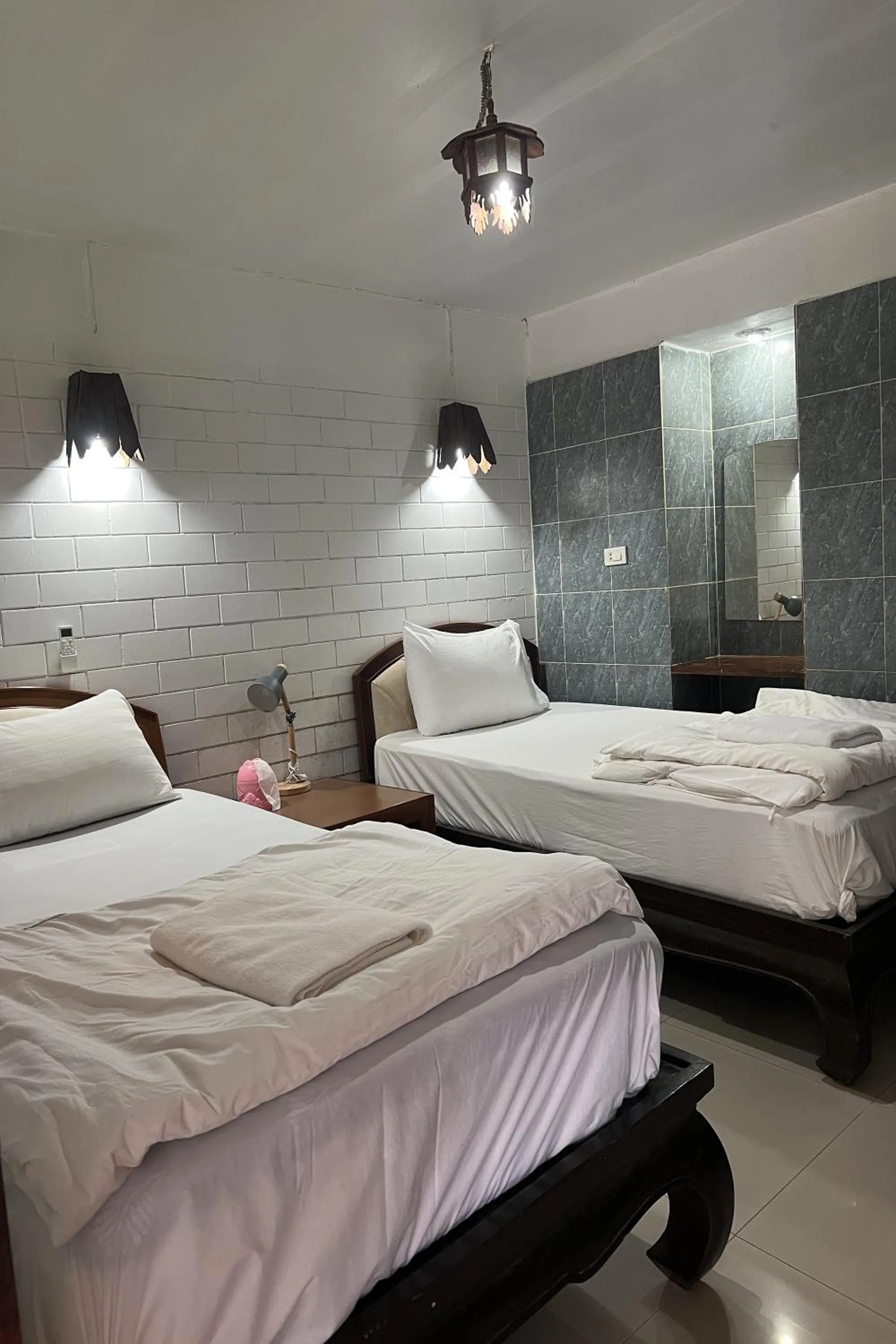 Bed in Baan Lanna Resort