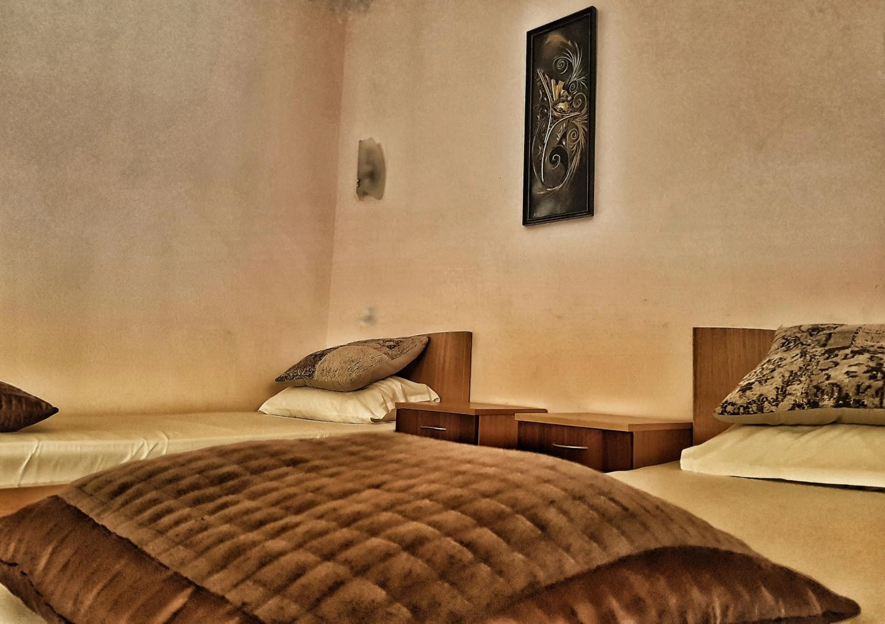 Bed in Discret Hotel & Restaurant