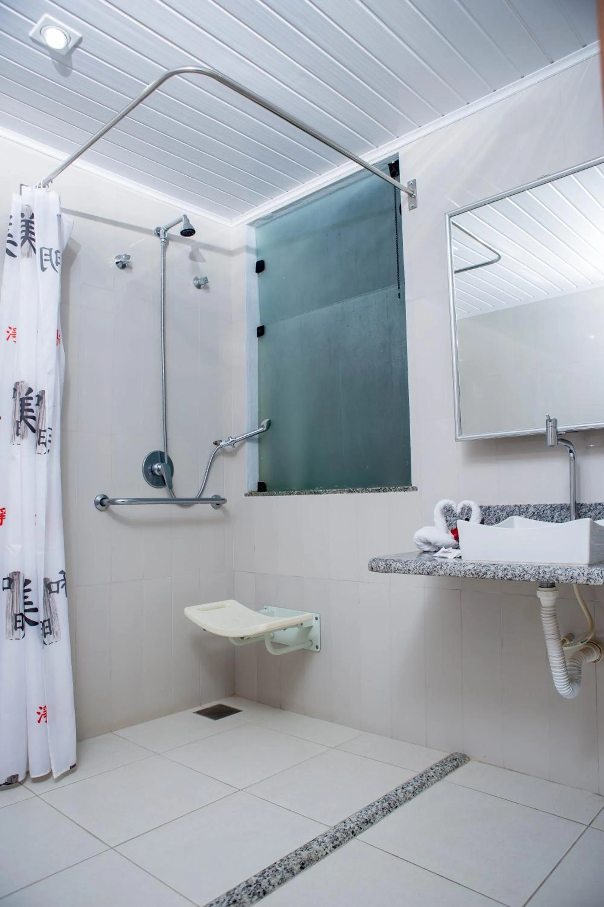 Bathroom in Hotel Porto Napolis