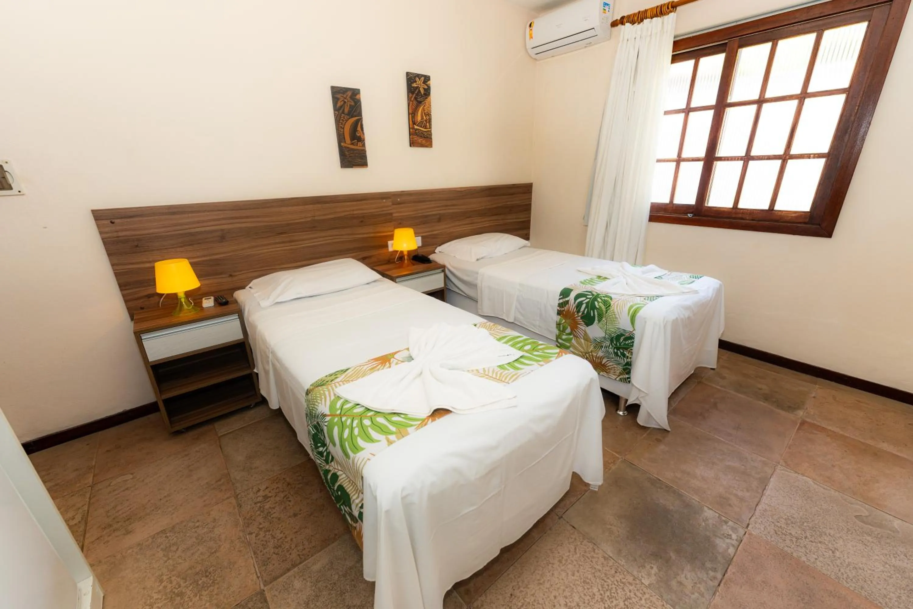 Bed in Hotel Pousada Salvador Paradise